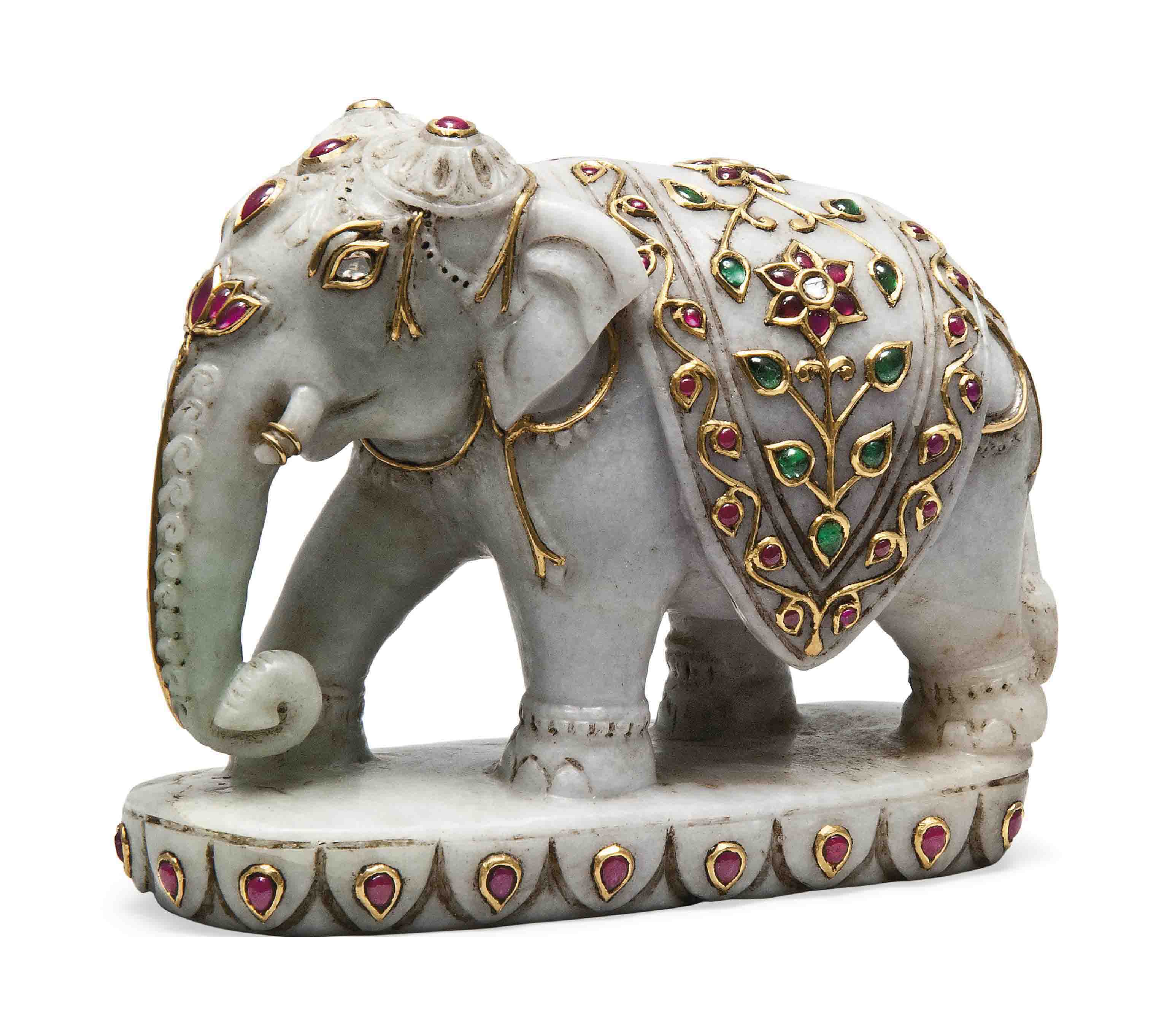A GEMSET JADE FIGURINE OF AN ELEPHANT , INDIA, LATE 19TH/EARLY 20TH