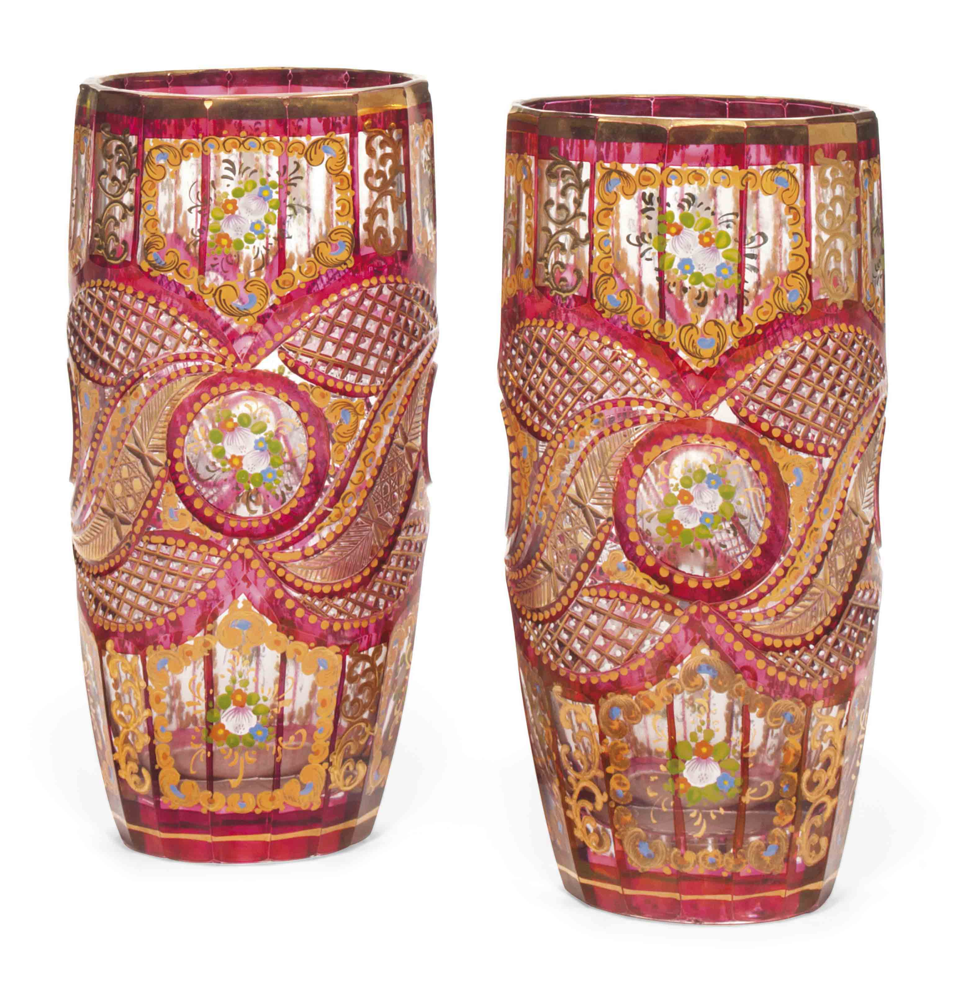 A PAIR OF BOHEMIAN CUT AND ENAMELLED CRANBERRYSTAINED GLASS VASES