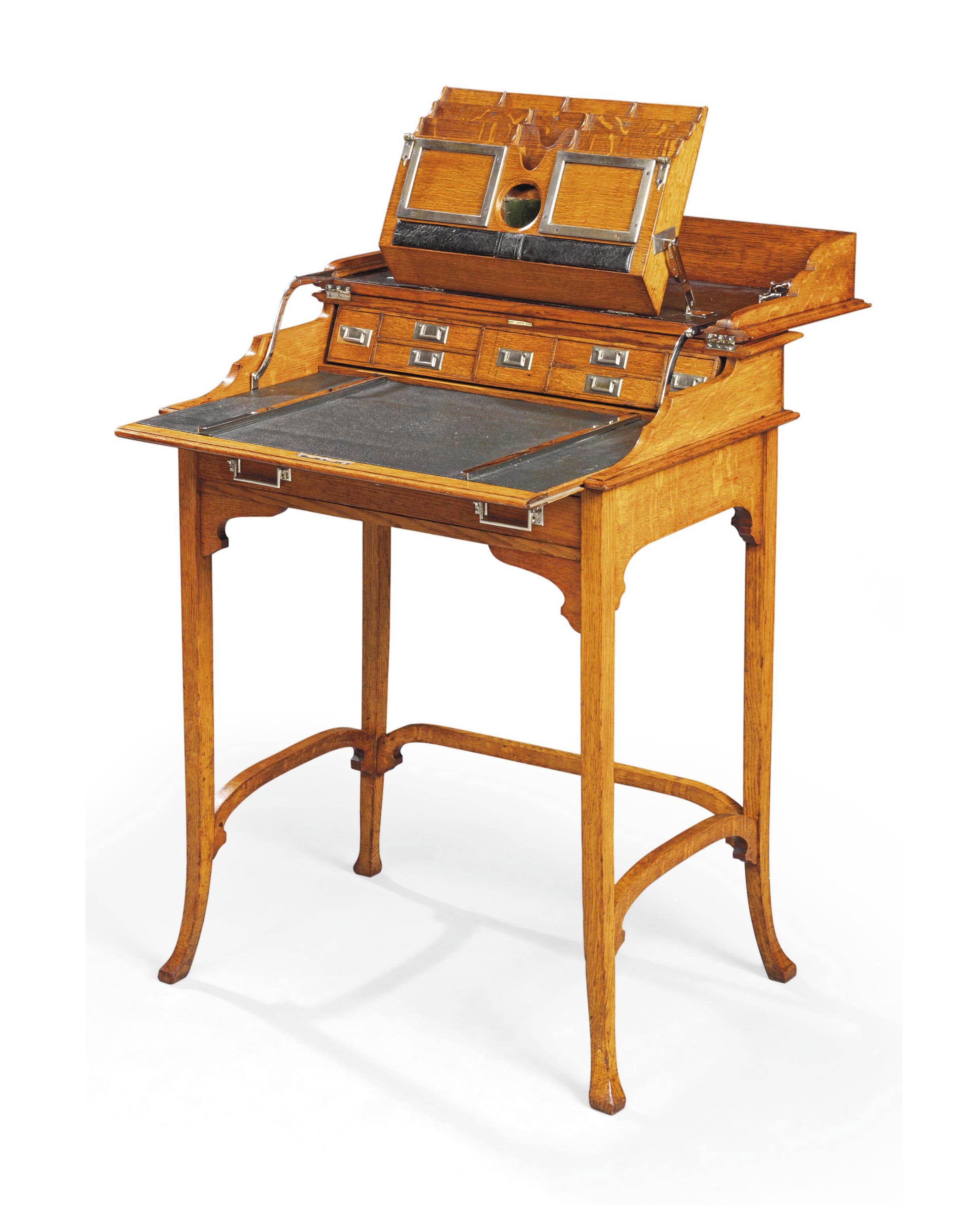 AN ARTS AND CRAFTS OAK 'CAMPAIGNTRAVEL' DESK , CIRCA 1910 Christie's