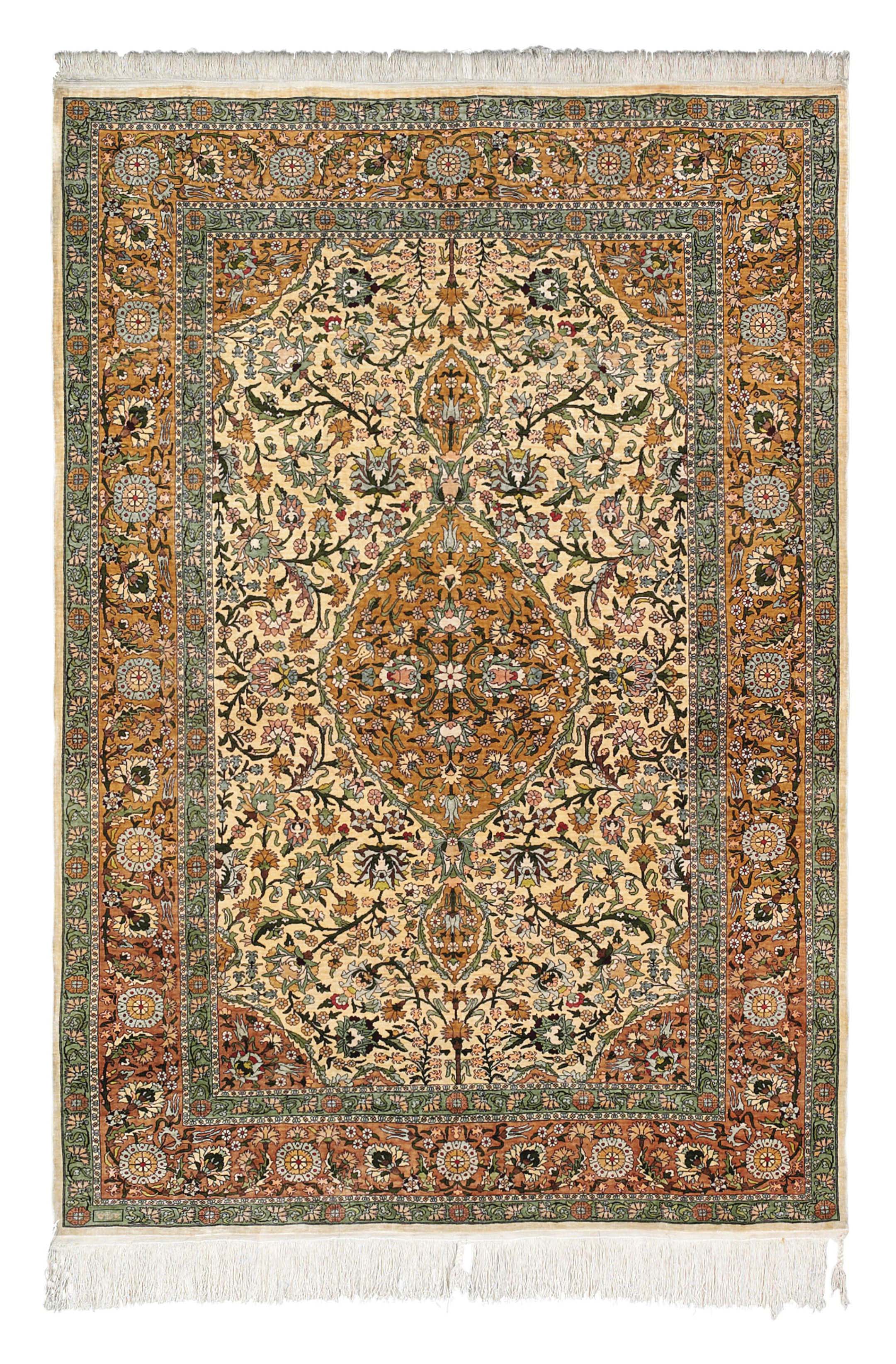 An extremely fine Hereke silk rug Christie's