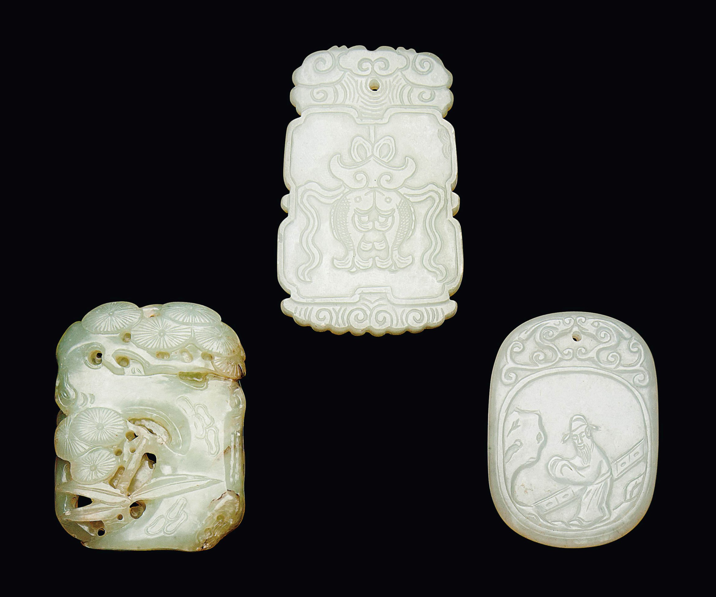 THREE JADE PENDANTS