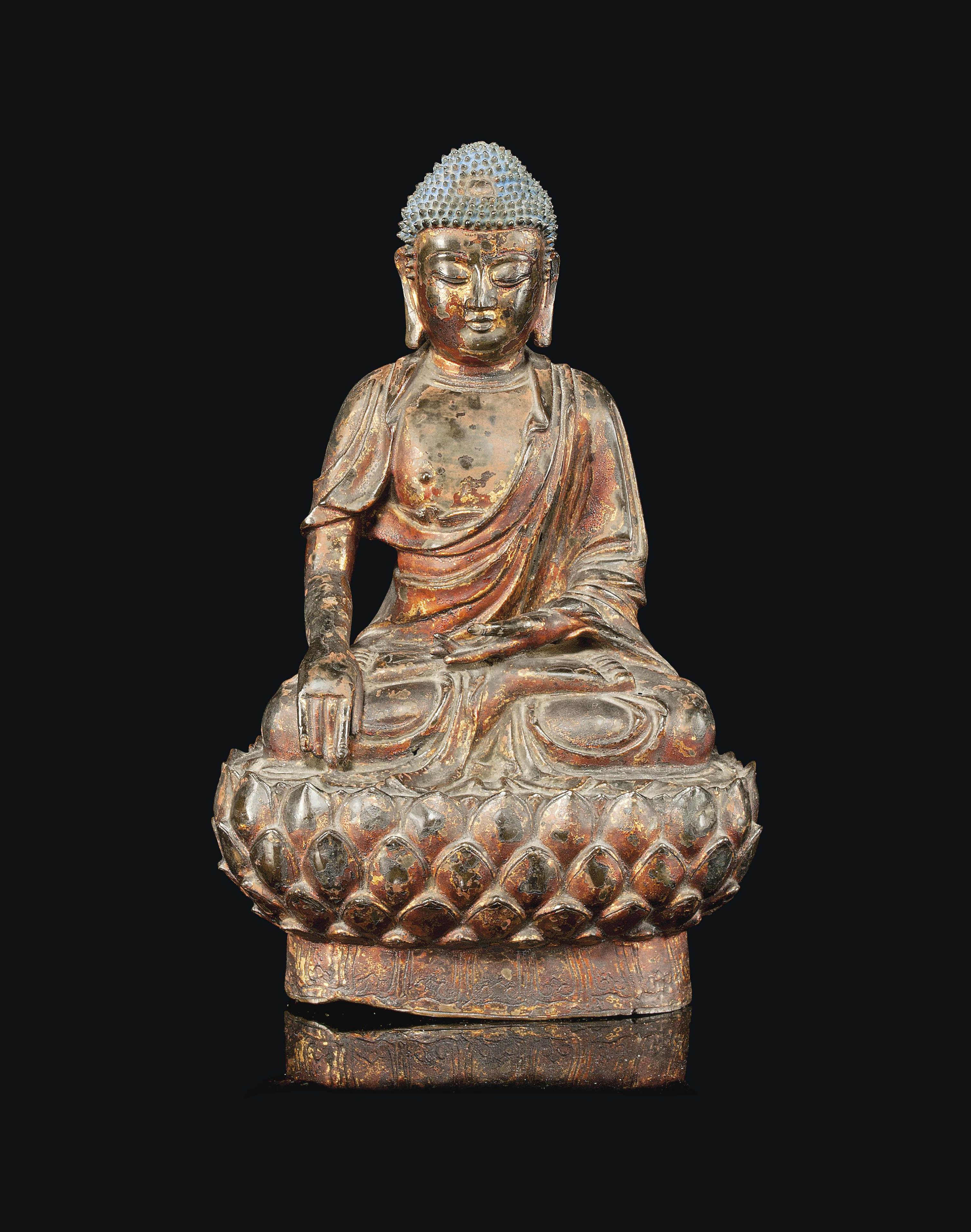 A GILTLACQUERED BRONZE FIGURE OF BUDDHA , MING DYNASTY (16TH/17TH