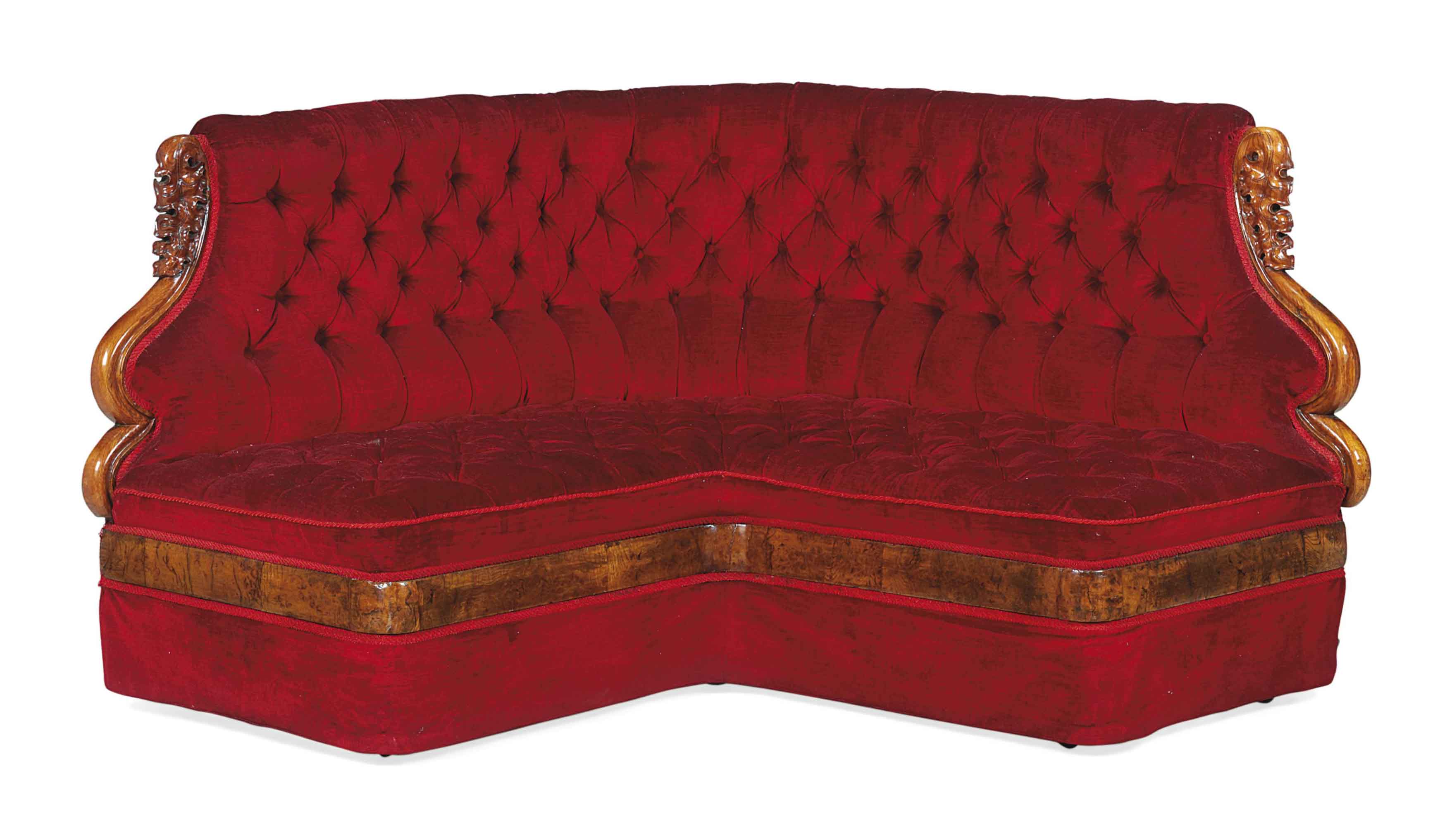 A MIDVICTORIAN BROWN OAK CORNER CONVERSATION SOFA , THIRD QUARTER 19TH