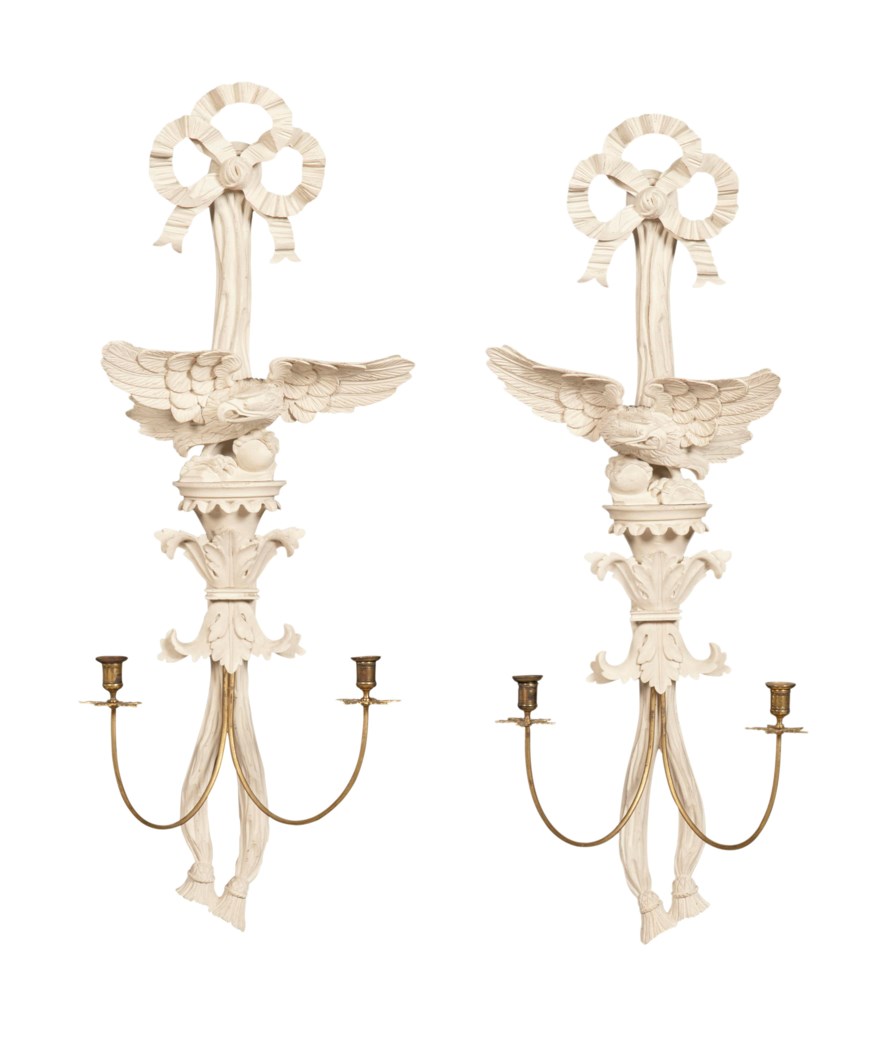 A SET OF FOUR WHITE-PAINTED WALL APPLIQUES