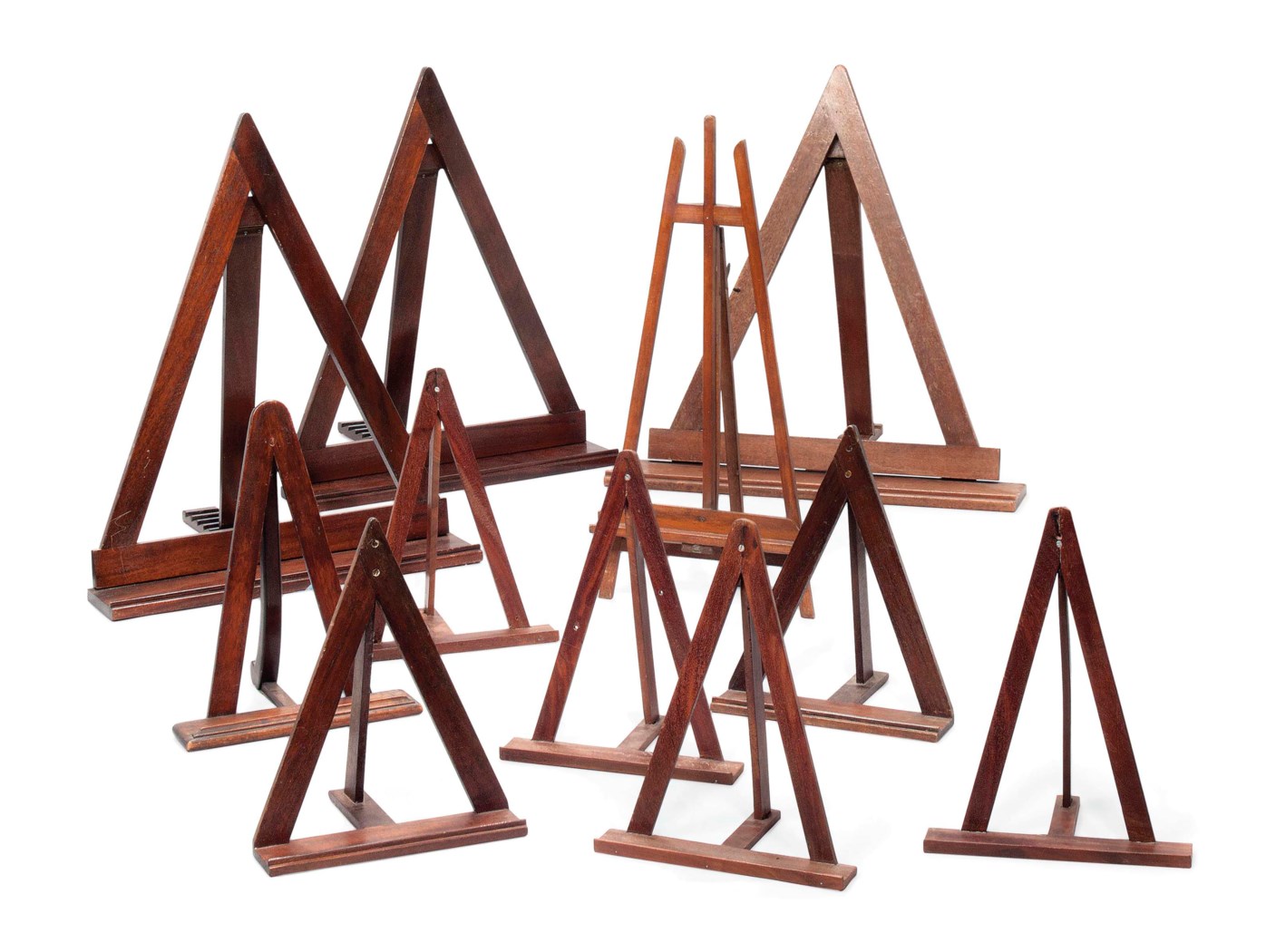 ELEVEN BRITISH MAHOGANY AND OTHER TABLE EASELS
