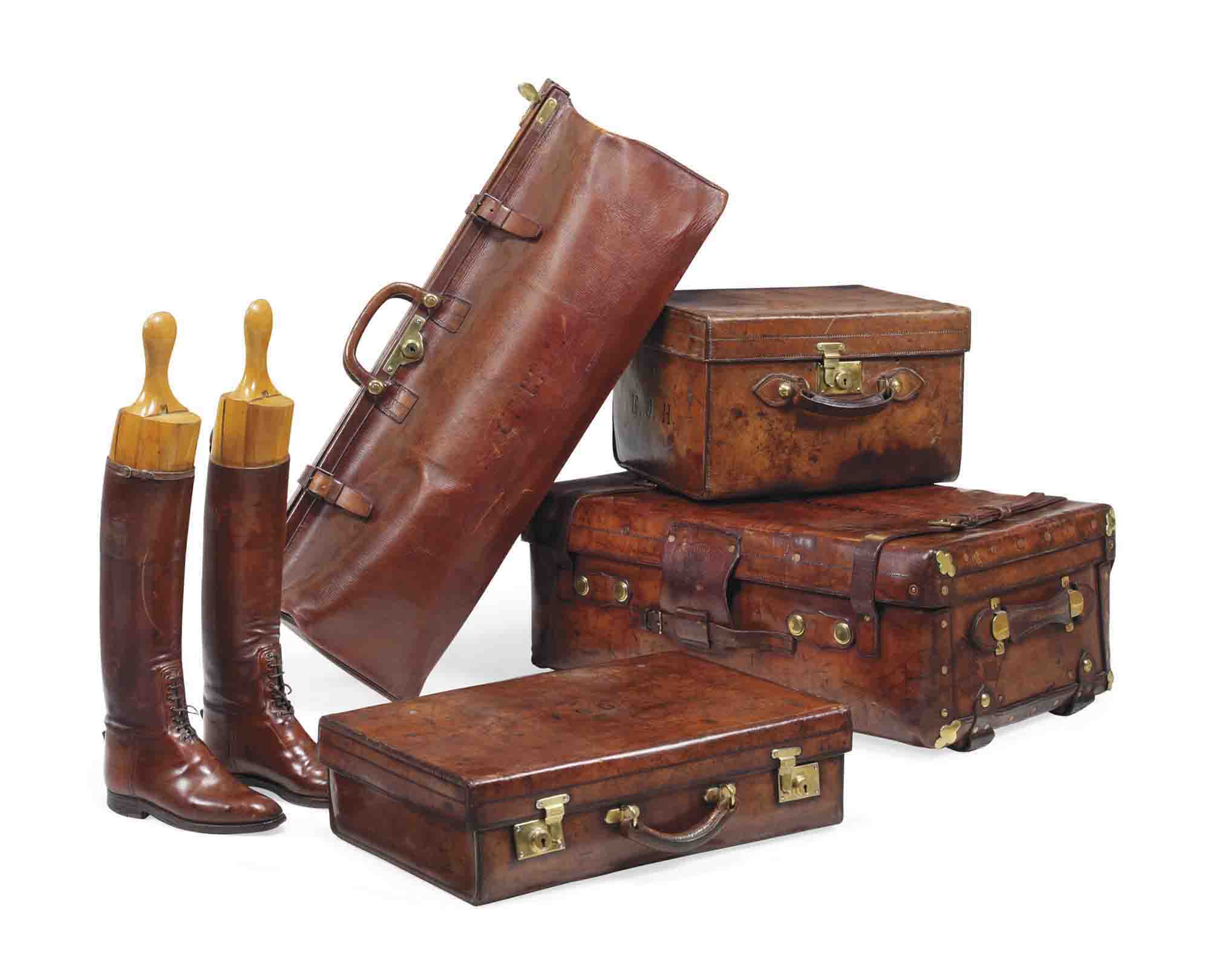 A GROUP OF FOUR VICTORIAN PIECES OF LEATHER LUGGAGE , SECOND HALF 19TH