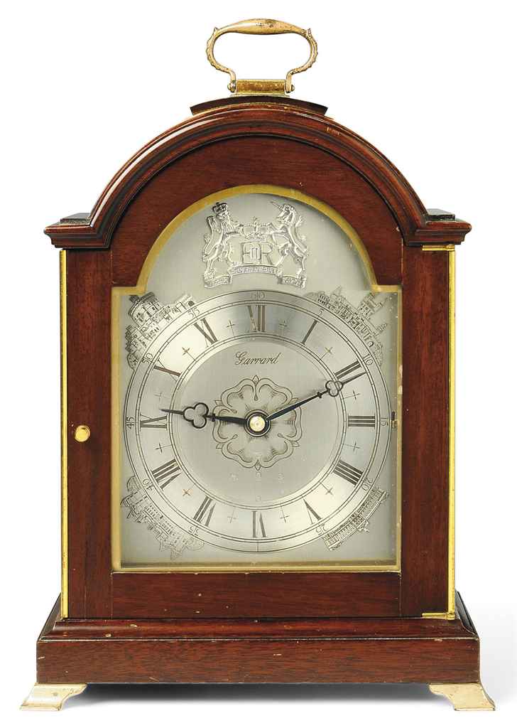 A QUEEN ELIZABETH II JUBILEE SILVERMOUNTED MAHOGANY QUARTER STRIKING