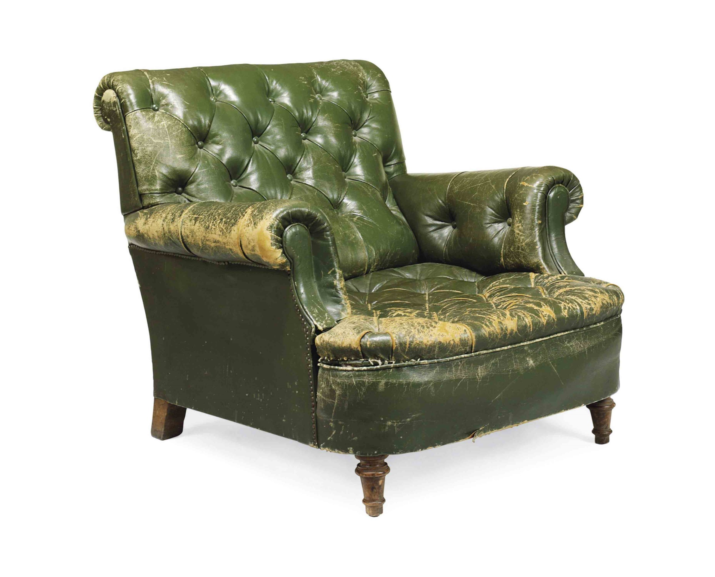 A SPANISH GREEN LEATHER ARMCHAIR