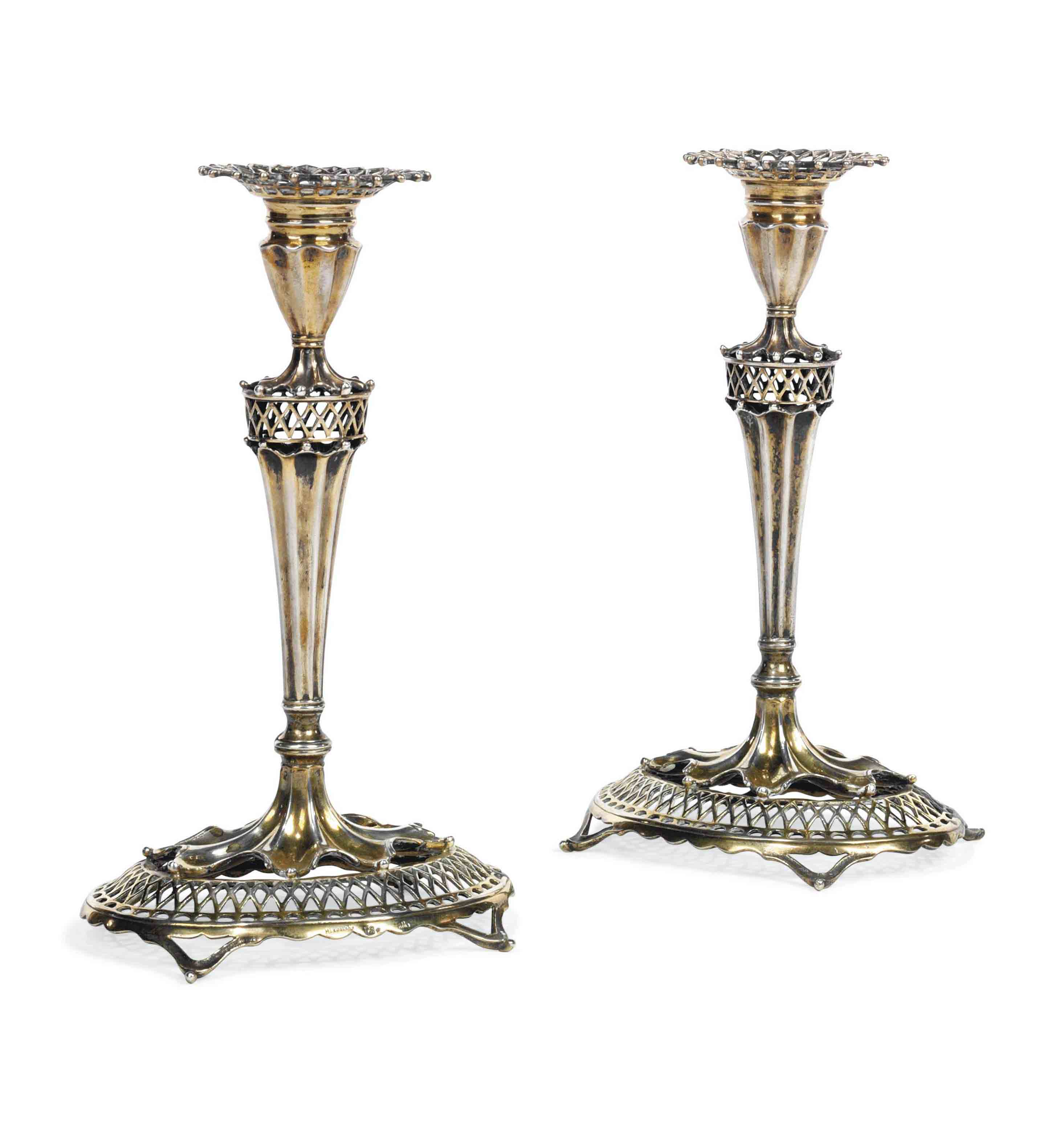A PAIR OF PORTUGUESE SILVERGILT CANDLESTICKS , CIRCA 1900, LISBON