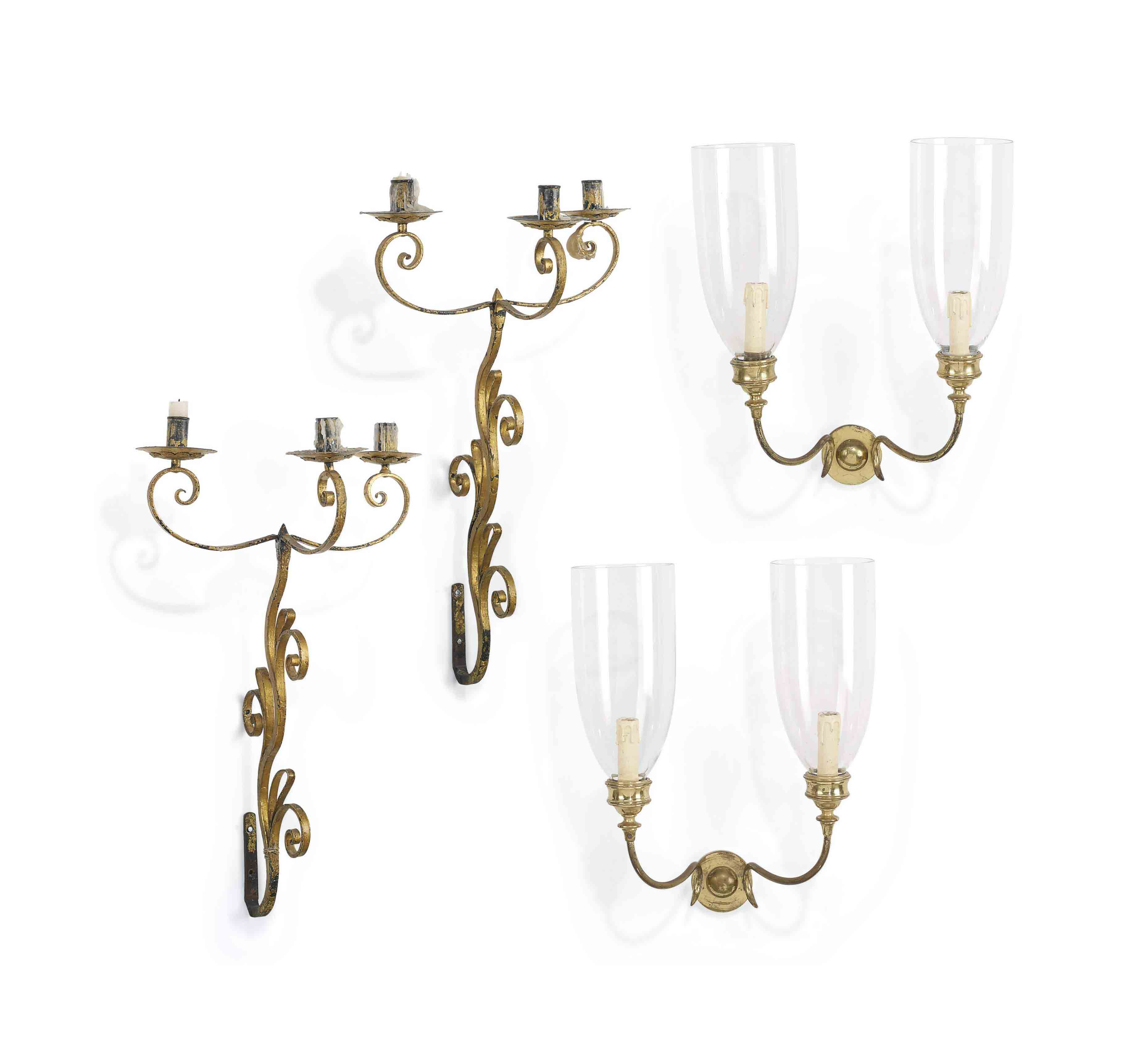 A PAIR OF SPANISH GILT WROUGHTIRON WALL APPLIQUES