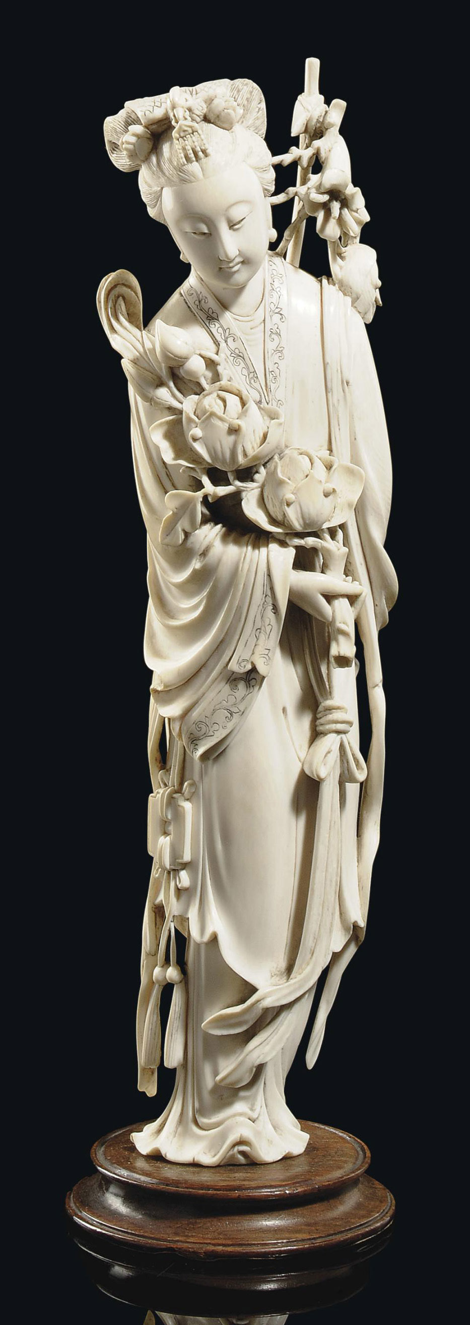 A CHINESE IVORY FIGURE OF A LADY , 19TH CENTURY Christie's