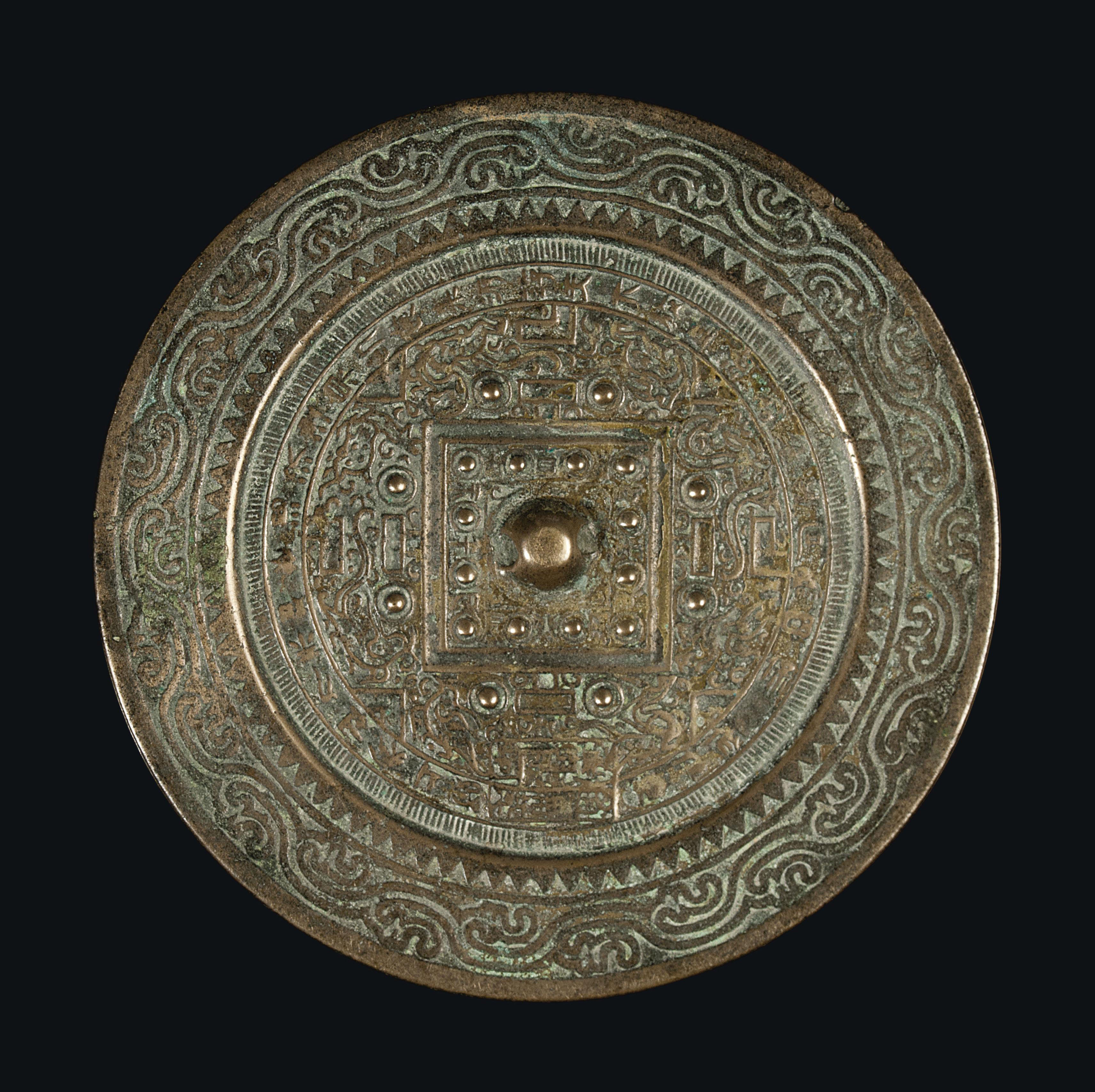 A CHINESE BRONZE 'TLV' MIRROR Christie's