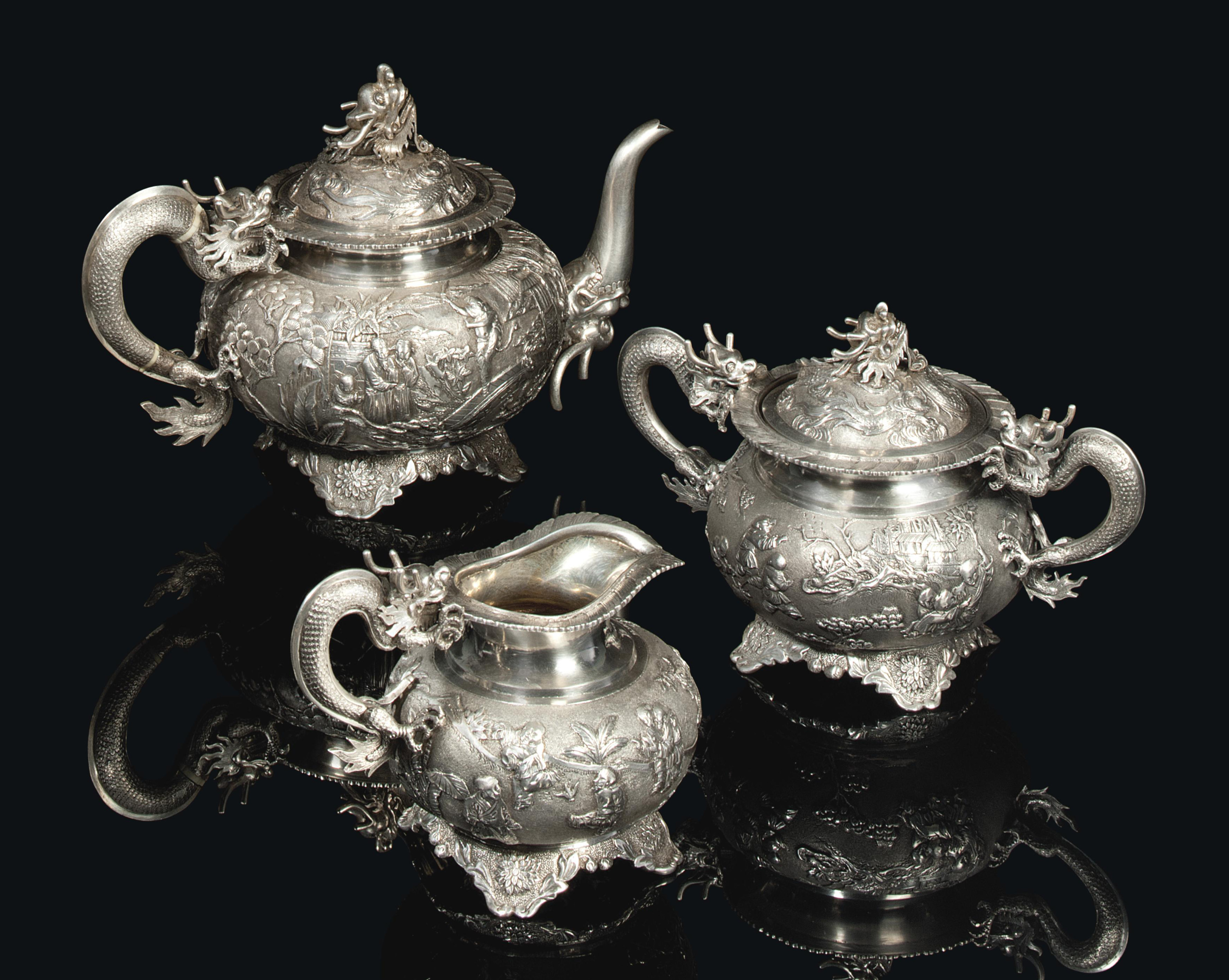 A CHINESE SILVER THREEPIECE TEA SET , CIRCA 1900 Christie's