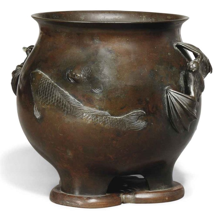 A JAPANESE BRONZE JARDINI RE WITH BAT HANDLES