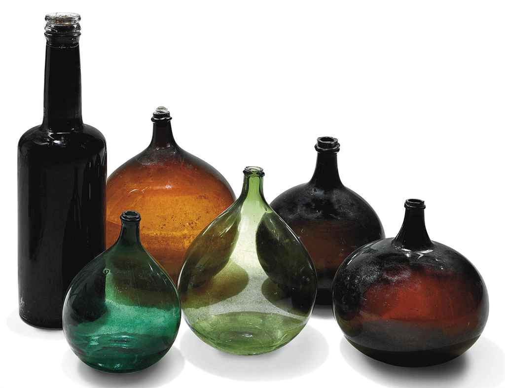 A COLLECTION OF ENGLISH COLOURED GLASS BOTTLES