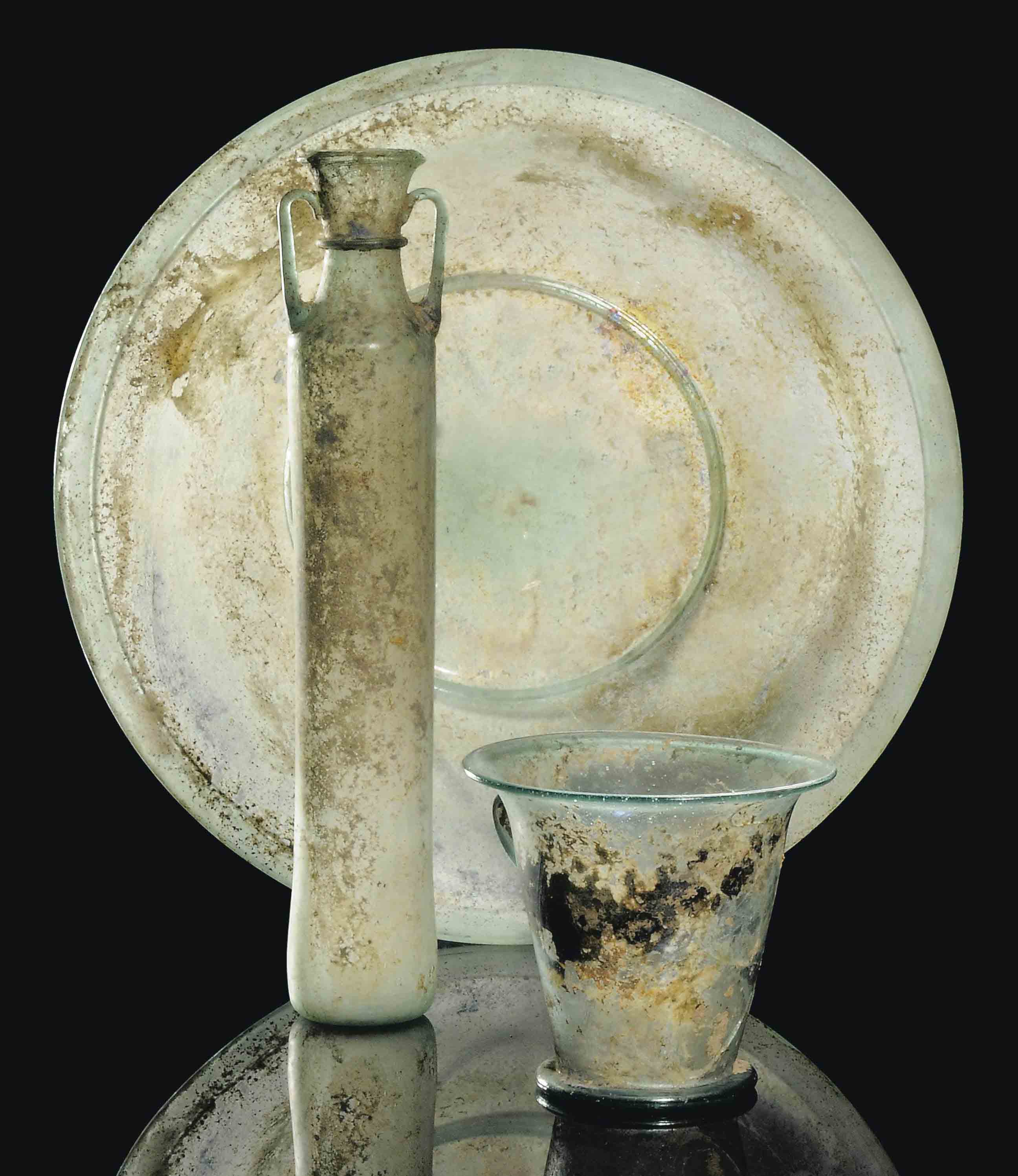 A LARGE ROMAN GREEN GLASS BOWL , CIRCA 2ND3RD CENTURY A.D. Christie's