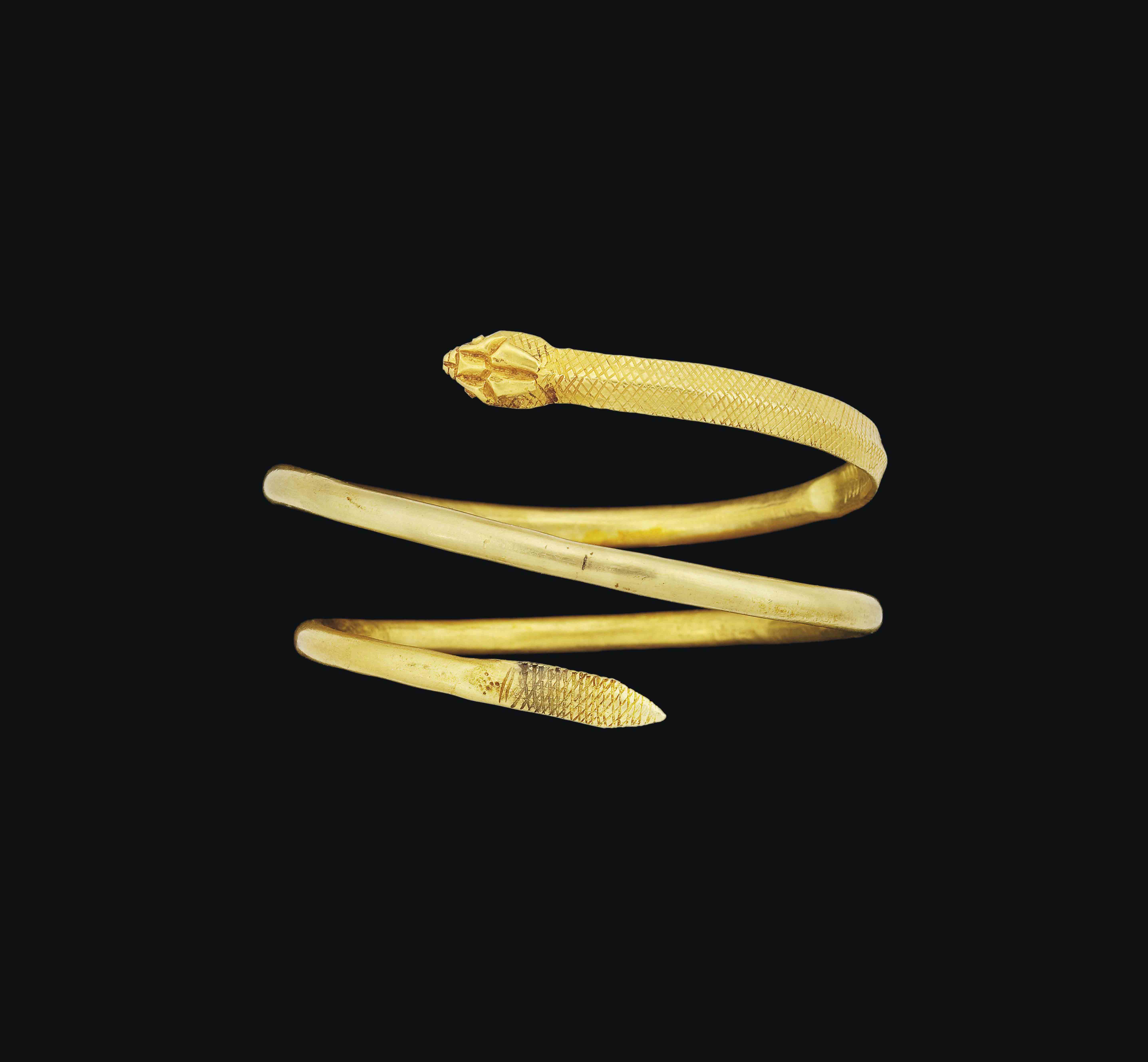 A ROMANOEGYPTIAN GOLD SPIRAL SNAKE BRACELET , CIRCA 1ST CENTURY A.D. Christie's
