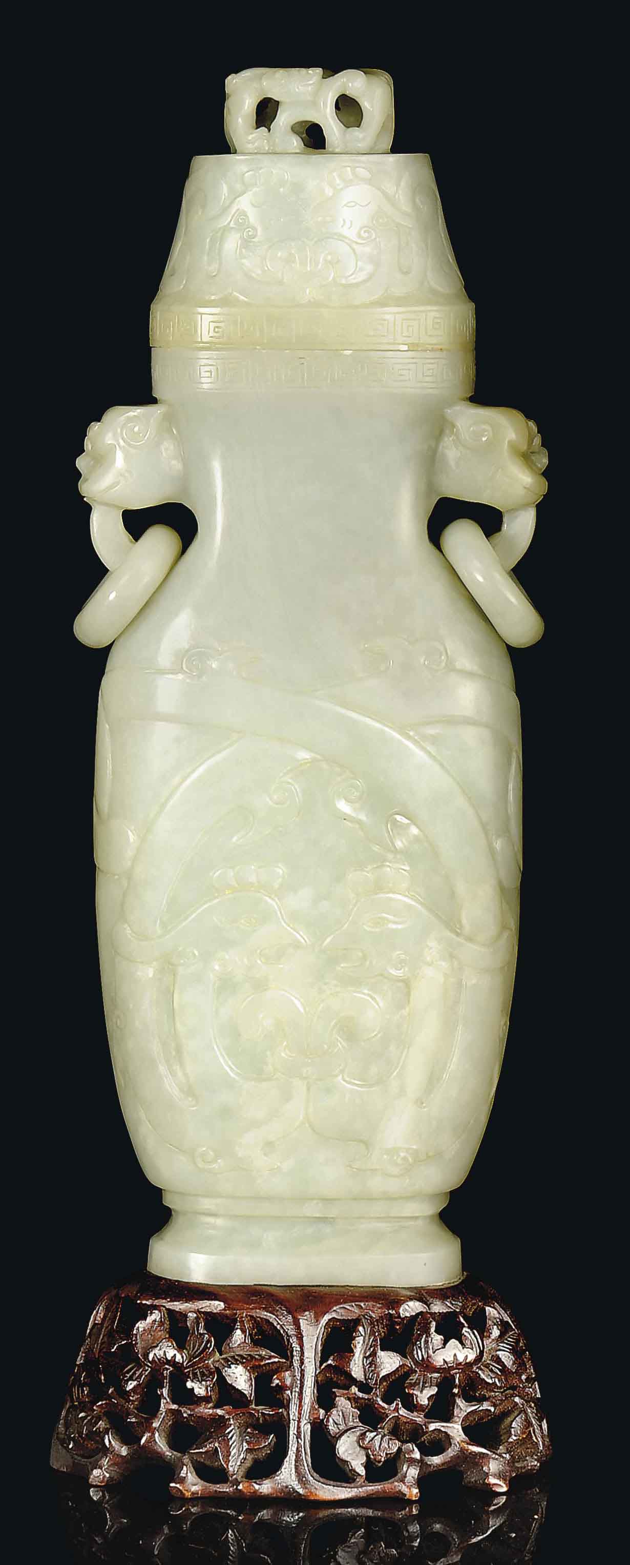 A PALE CELADON JADE VASE AND COVER