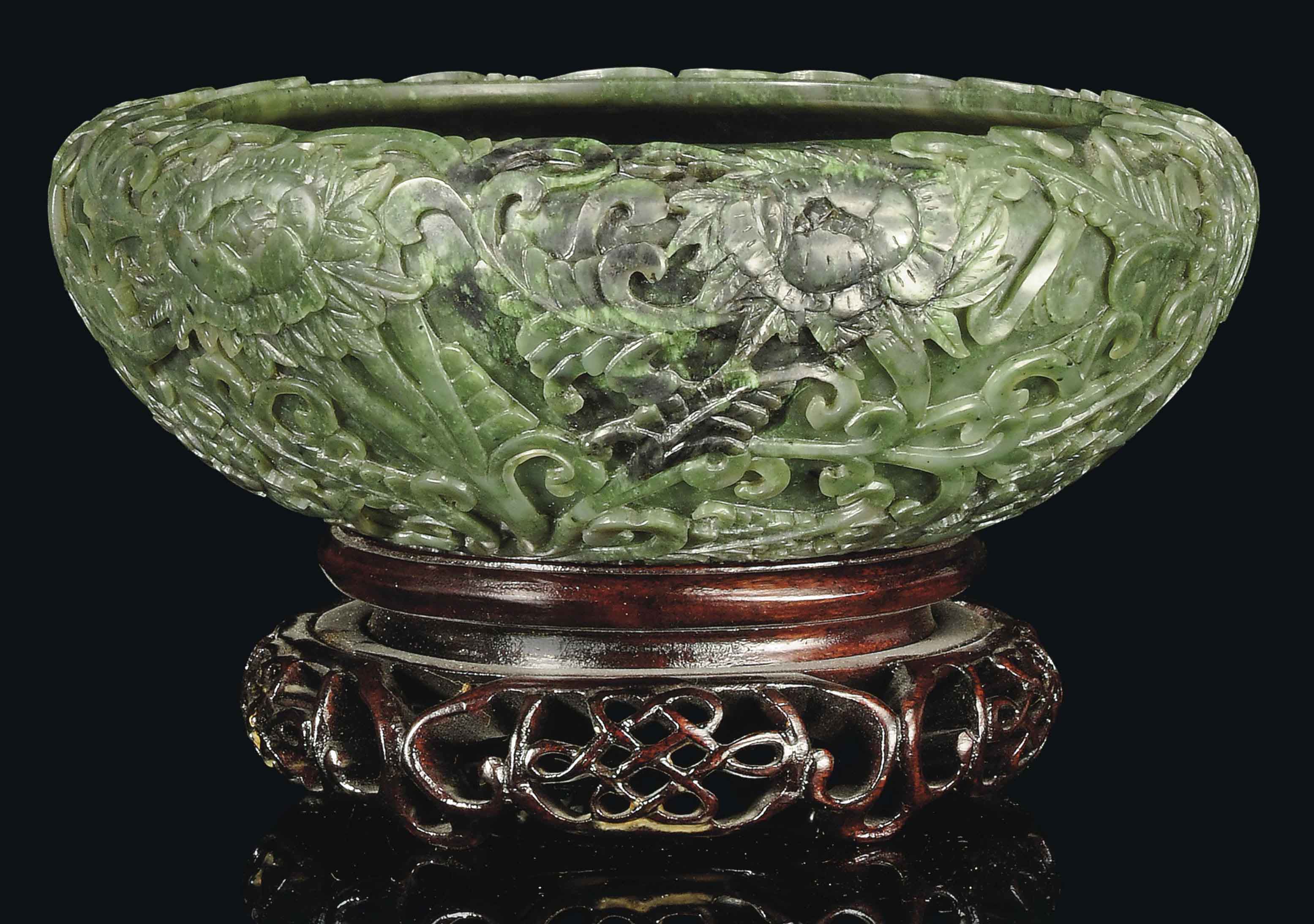 A SPINACH JADE ALMS BOWL , 18TH CENTURY OR LATER Christie's