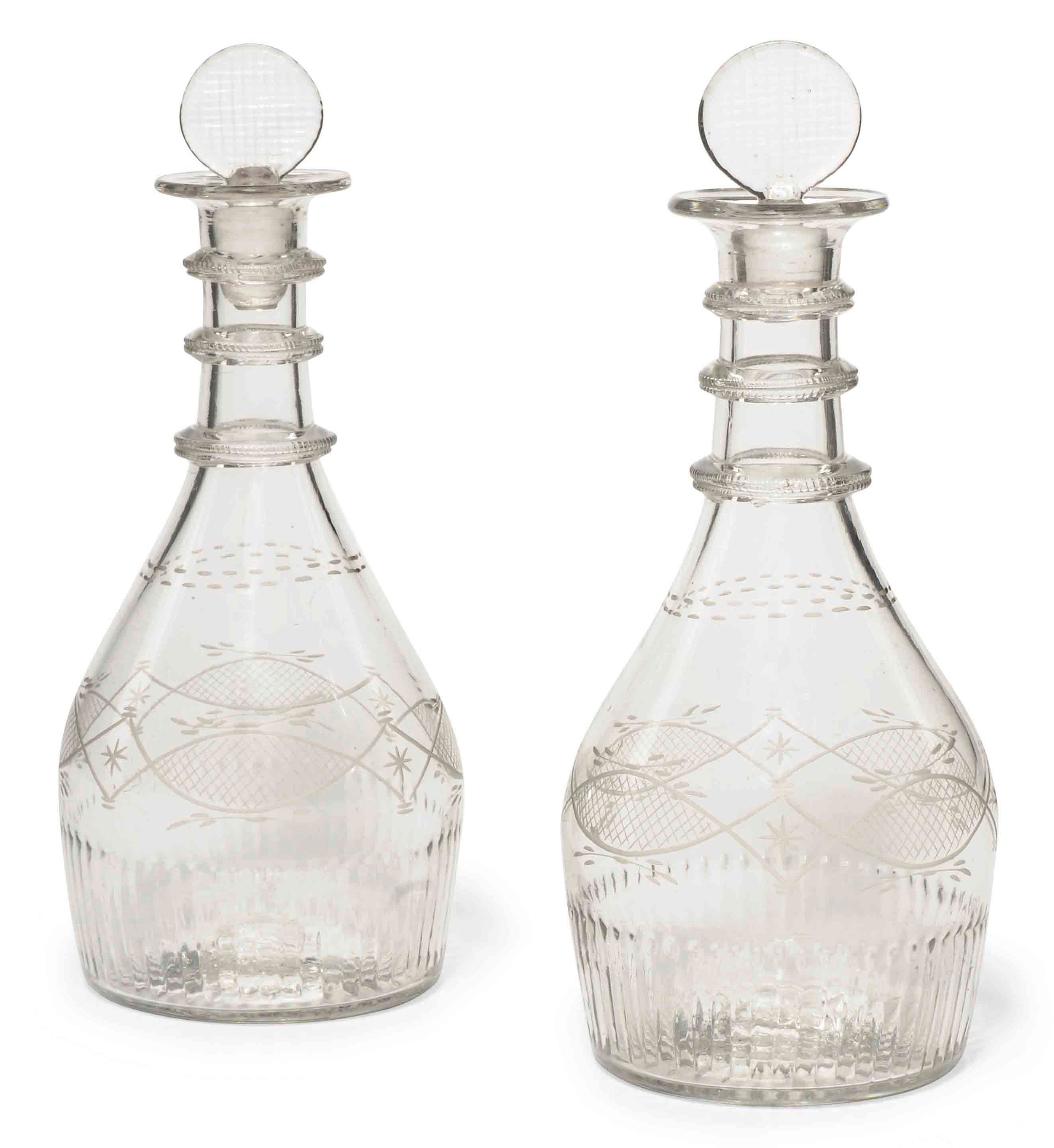 A PAIR OF IRISH (CORK GLASS CO.) DECANTERS AND STOPPERS , CIRCA 1800