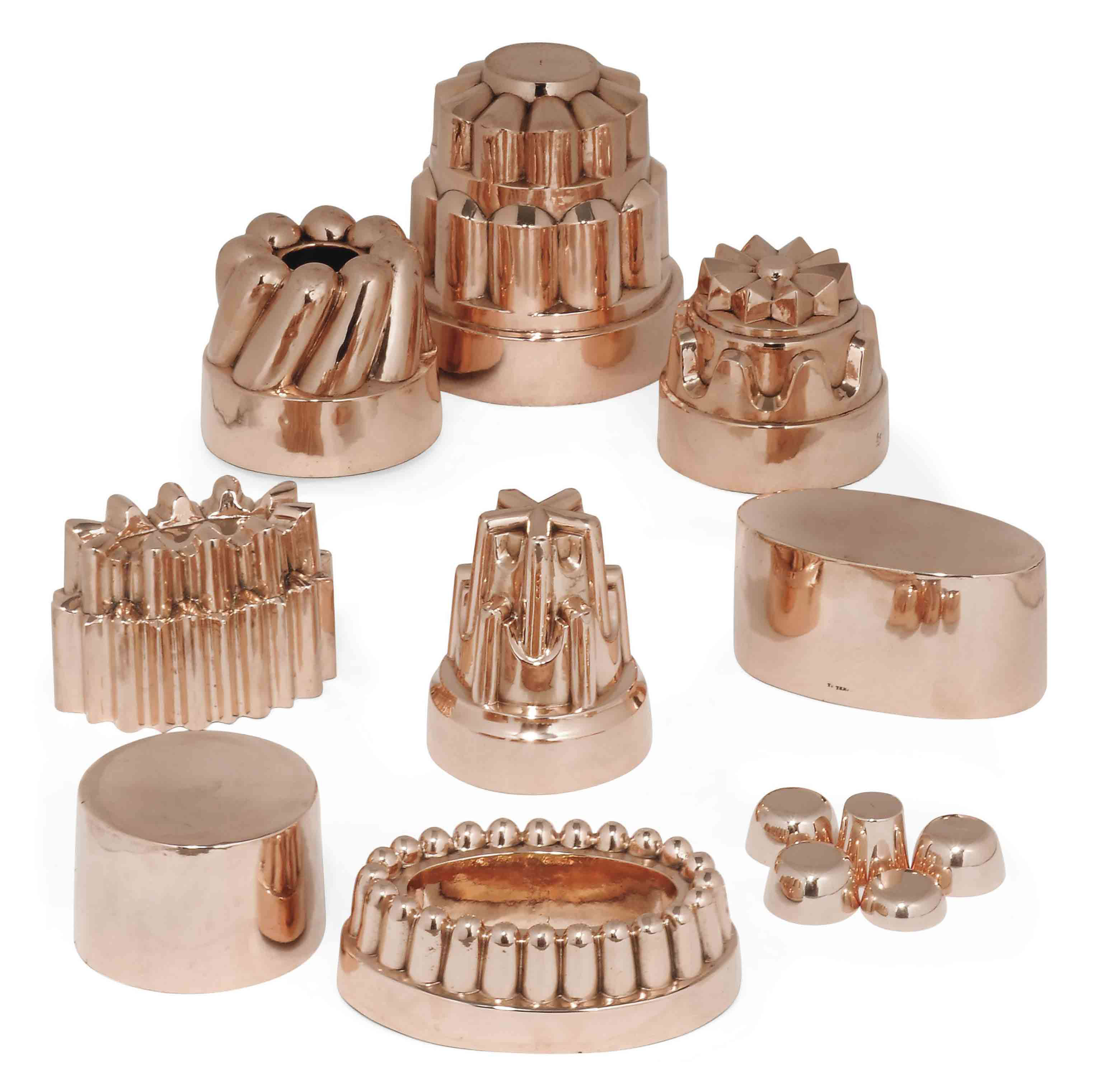 A COLLECTION OF EIGHT LARGE VICTORIAN COPPER JELLY MOULDS , LATE 19TH