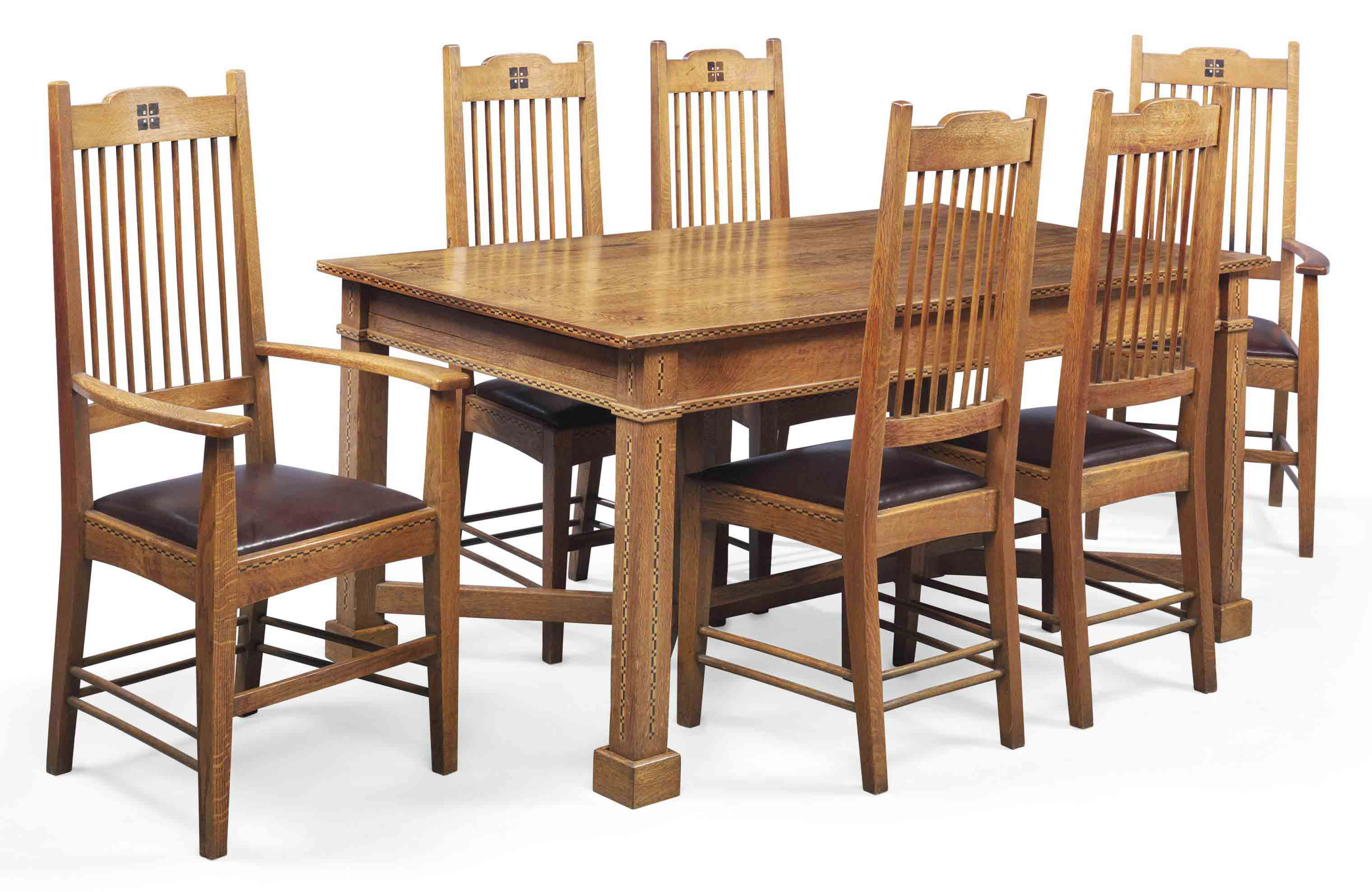 An Arts Crafts Inlaid Oak Dining Room Suite Circa 1910