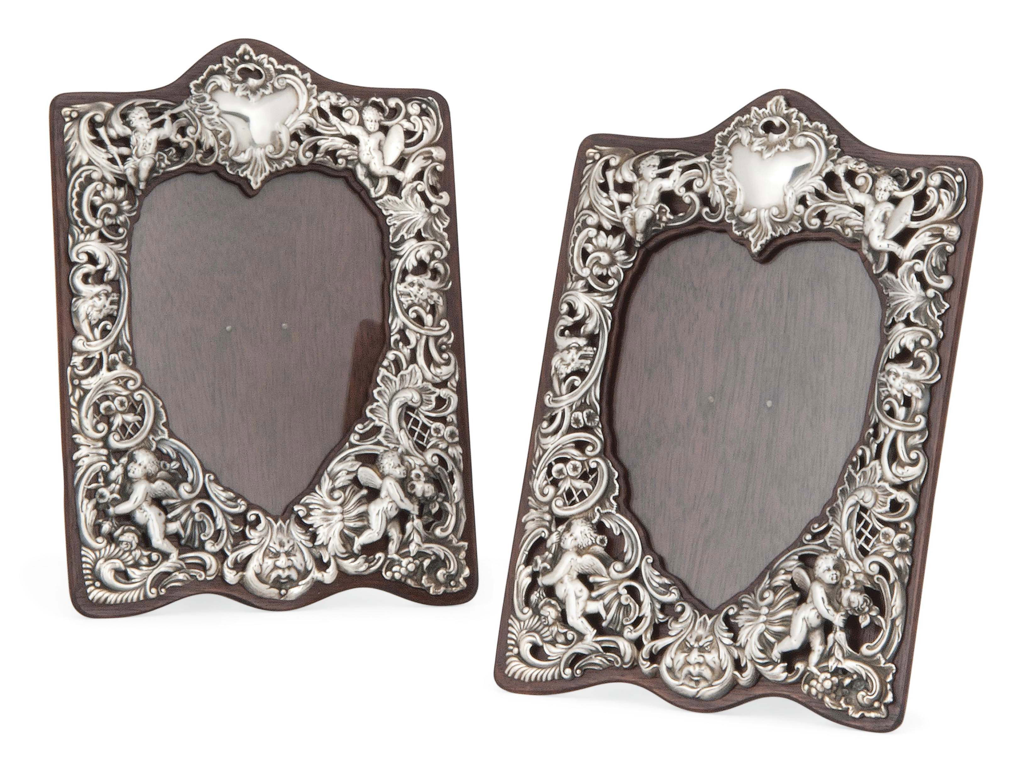 A PAIR OF VICTORIAN SILVER PHOTOGRAPH FRAMES