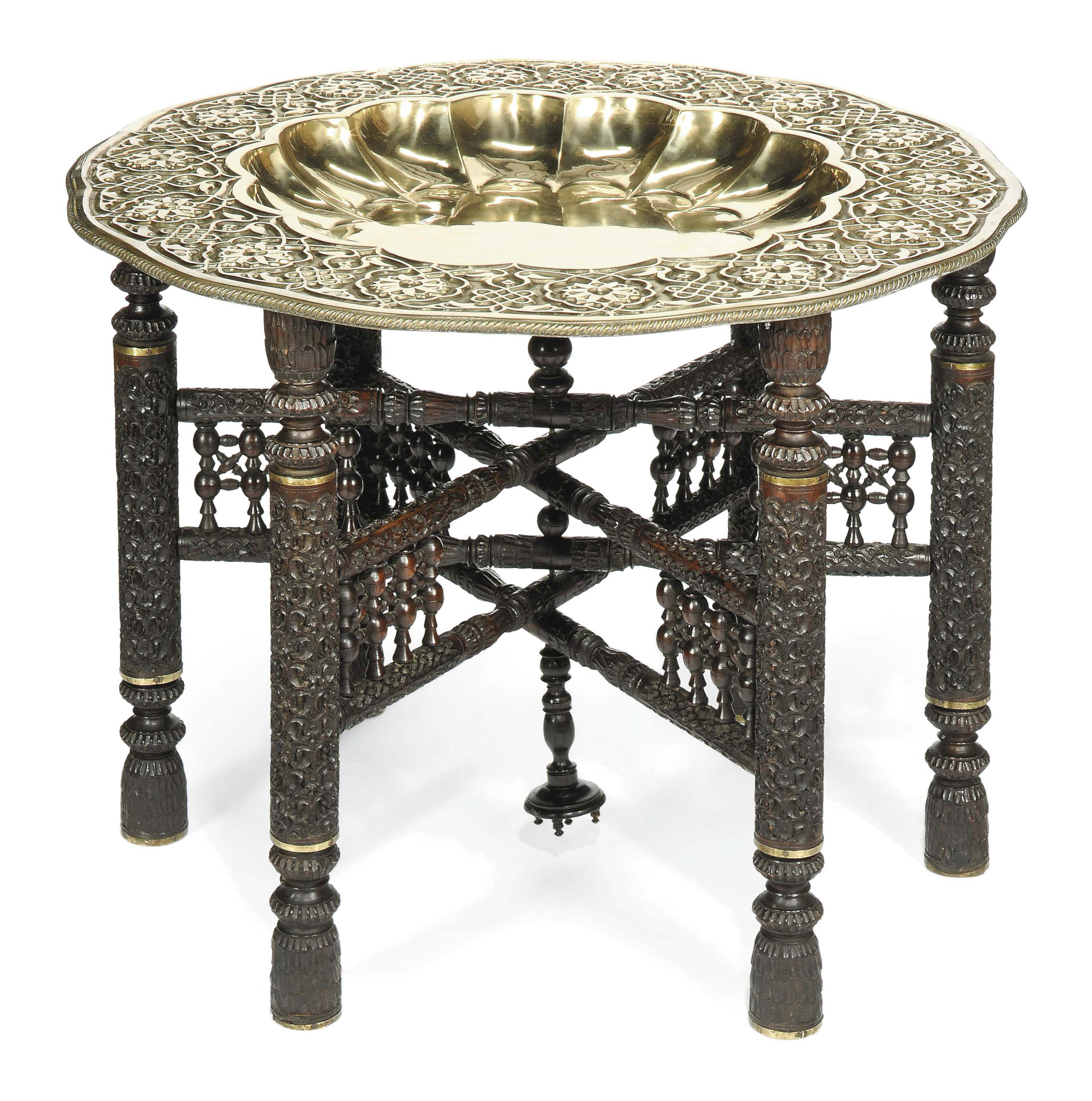 AN INDIAN EMBOSSED BRASS COFFEE TABLE , CIRCA 1930 Christie's