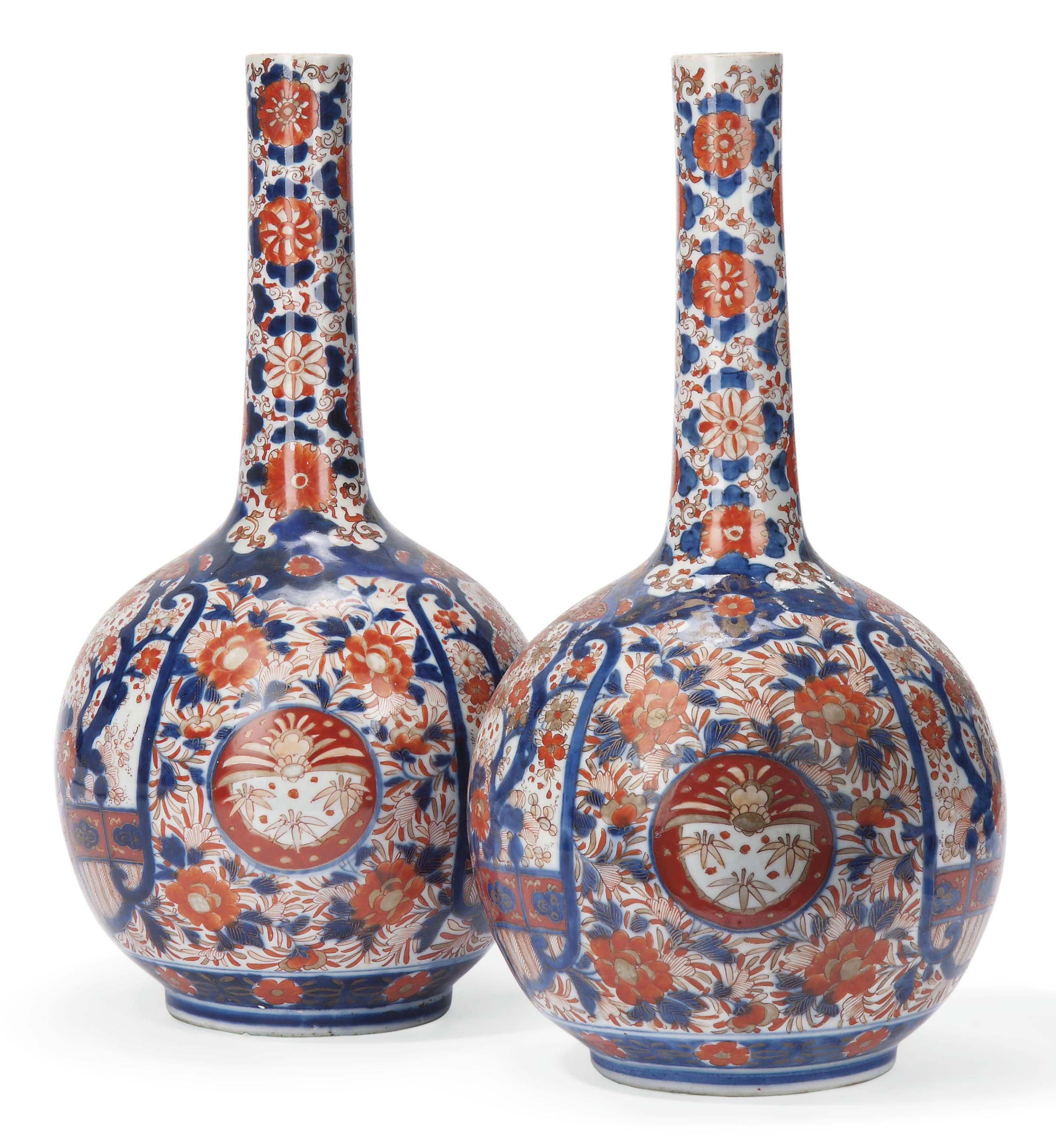 A PAIR OF LARGE JAPANESE IMARI BOTTLE VASES , 19TH/20TH CENTURY