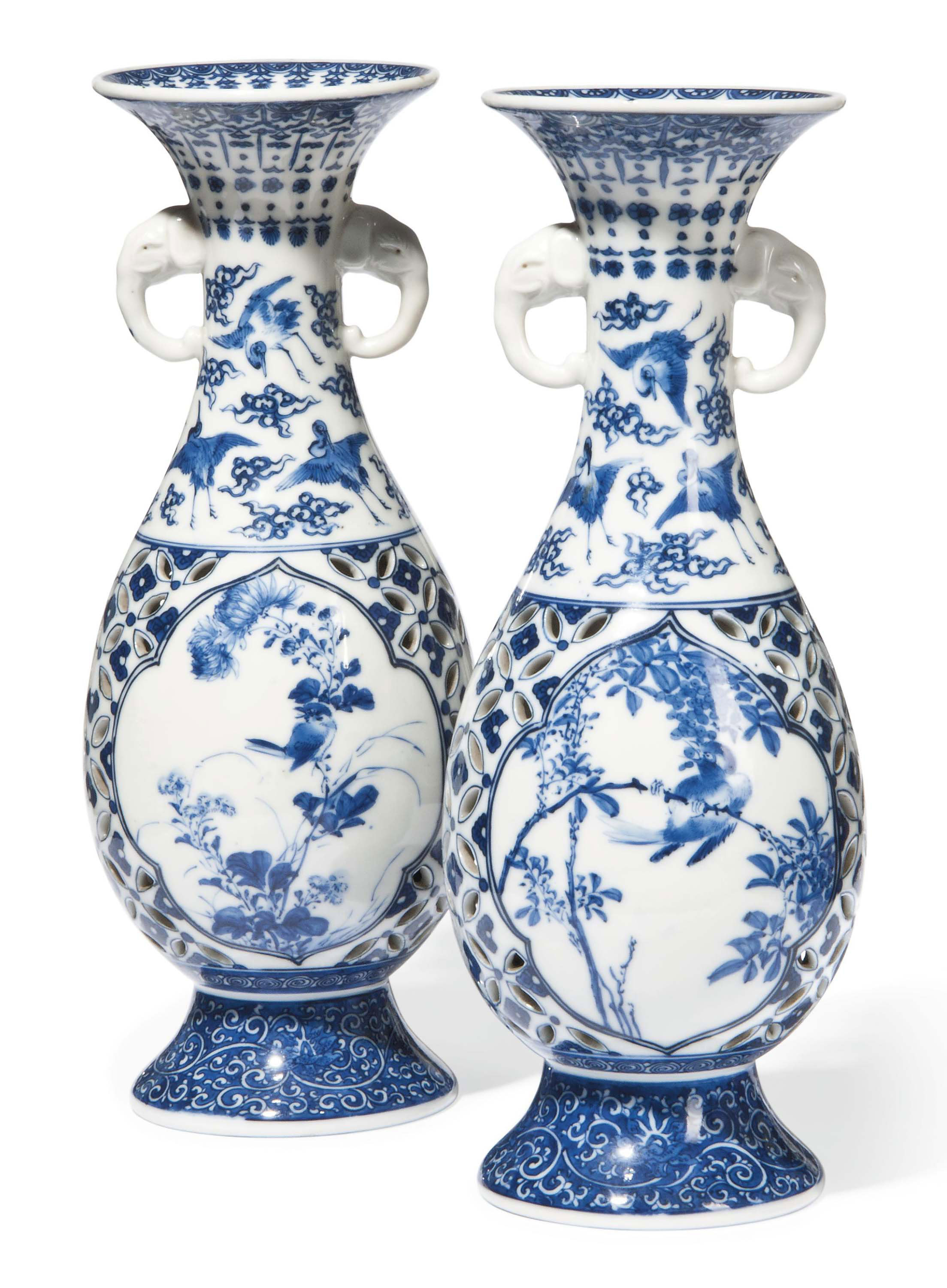 A PAIR OF JAPANESE BLUE AND WHITE PIERCED VASES , 19TH CENTURY Christie's