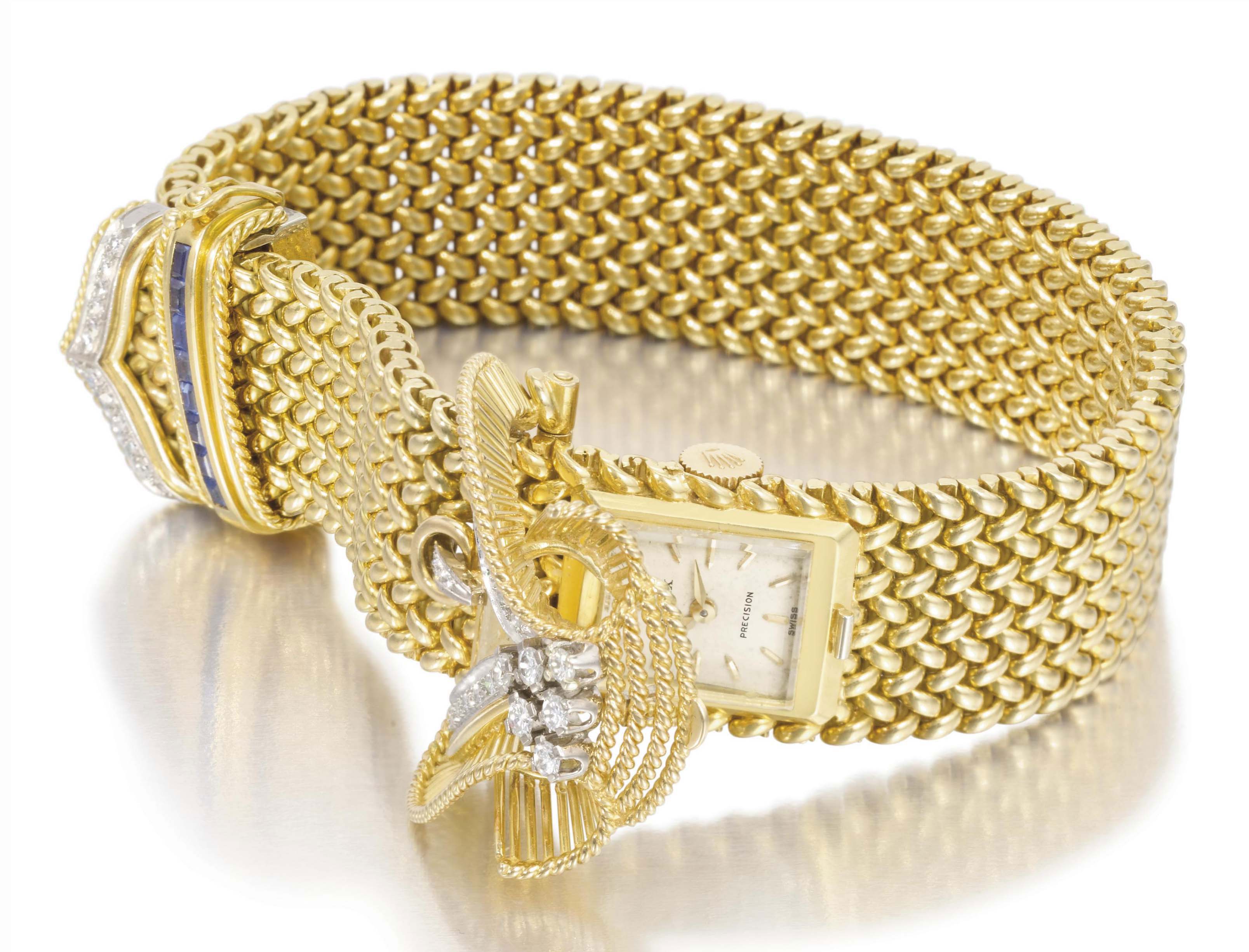 Rolex. A lady's rare and unusual 18K gold, sapphire and diamondset