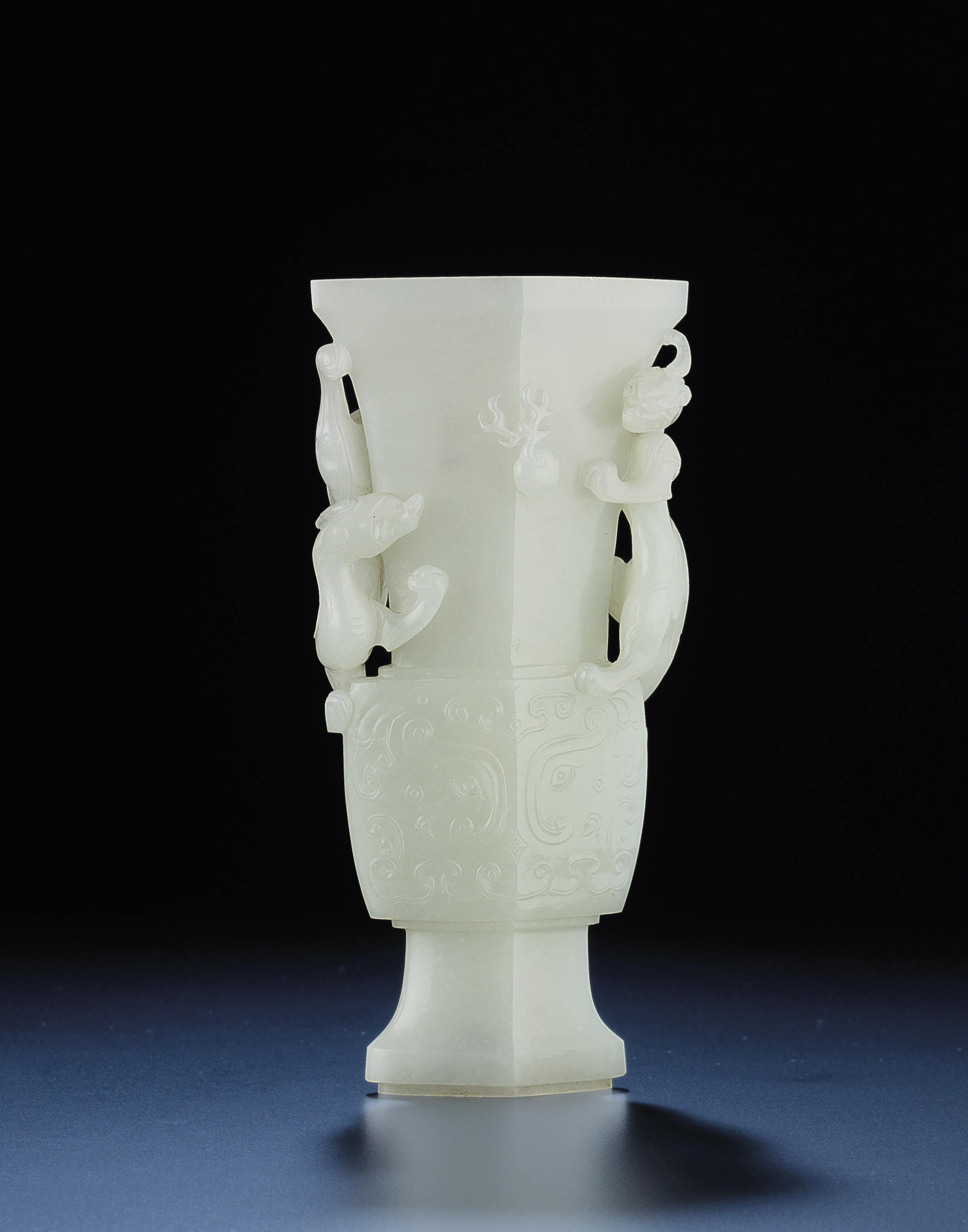 A FINELY CARVED WHITE JADE ARCHAISTIC VASE , QING DYNASTY, 18TH CENTURY