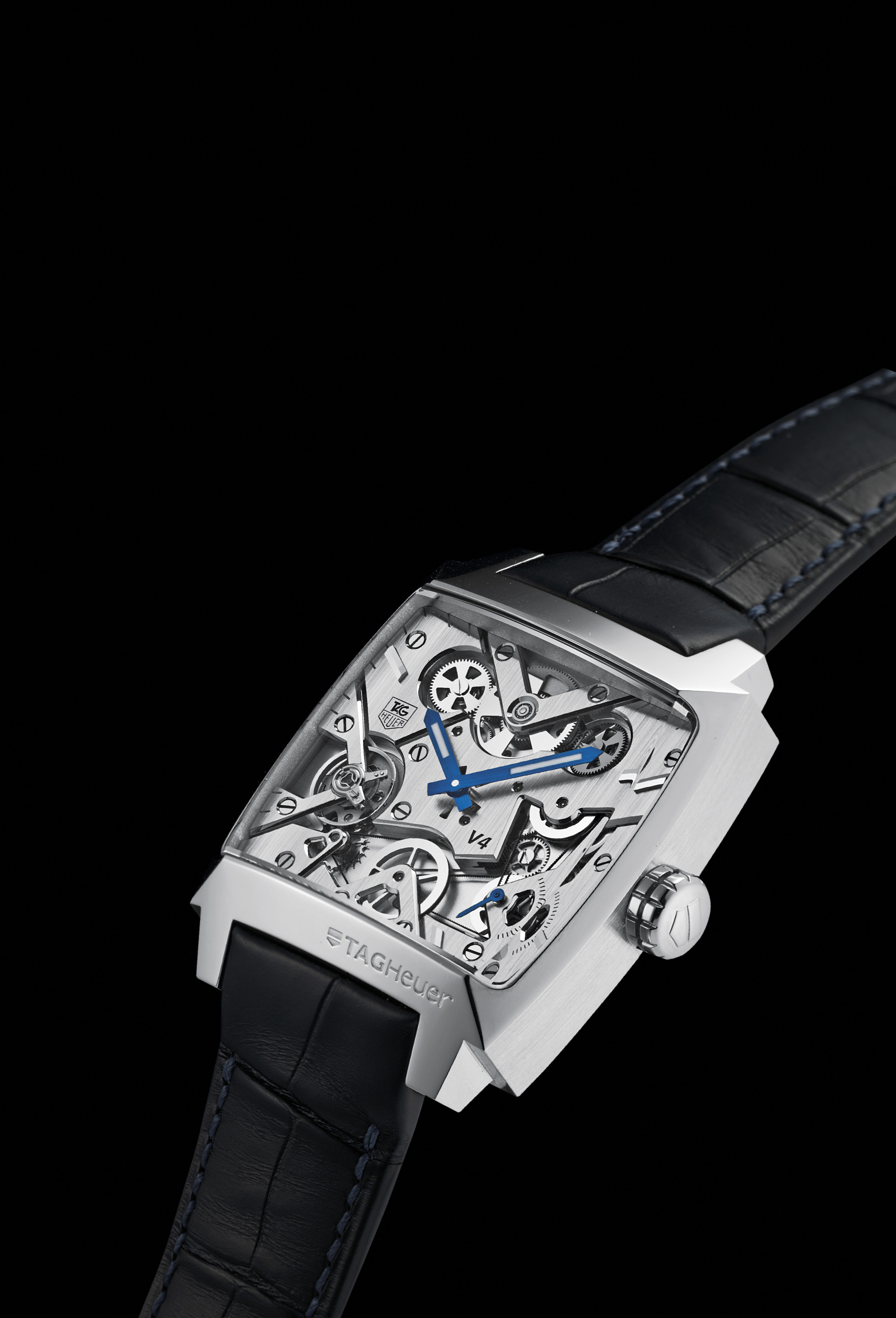 TAG HEUER. A FINE AND RARE PLATINUM LIMITED EDITION AUTOMATIC SKELETONIZED WRISTWATCH , SIGNED 