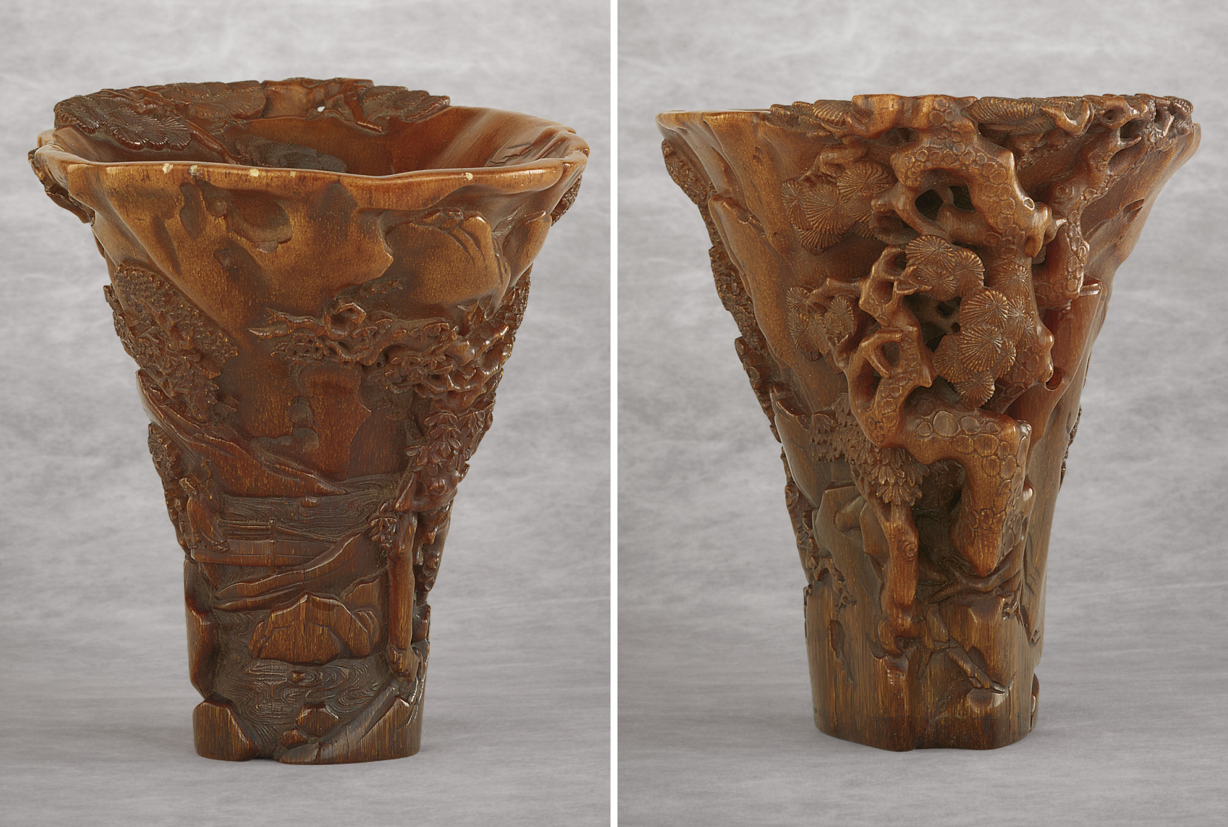 AN EXCEPTIONALLY WELLCARVED RHINOCEROS HORN LIBATION CUP