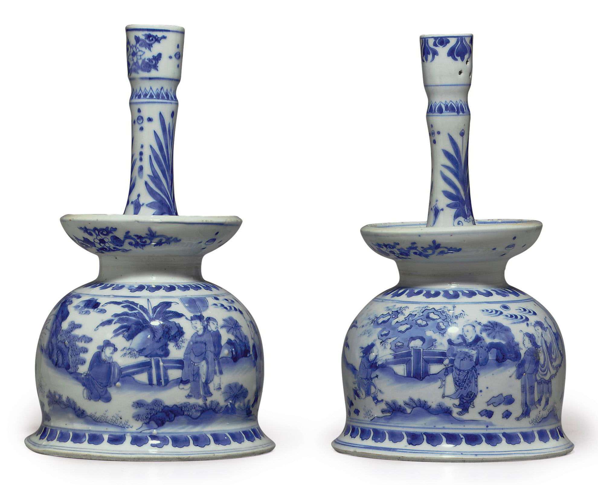 A LARGE PAIR OF BLUE AND WHITE CANDLESTICKS , TRANSITIONAL PERIOD