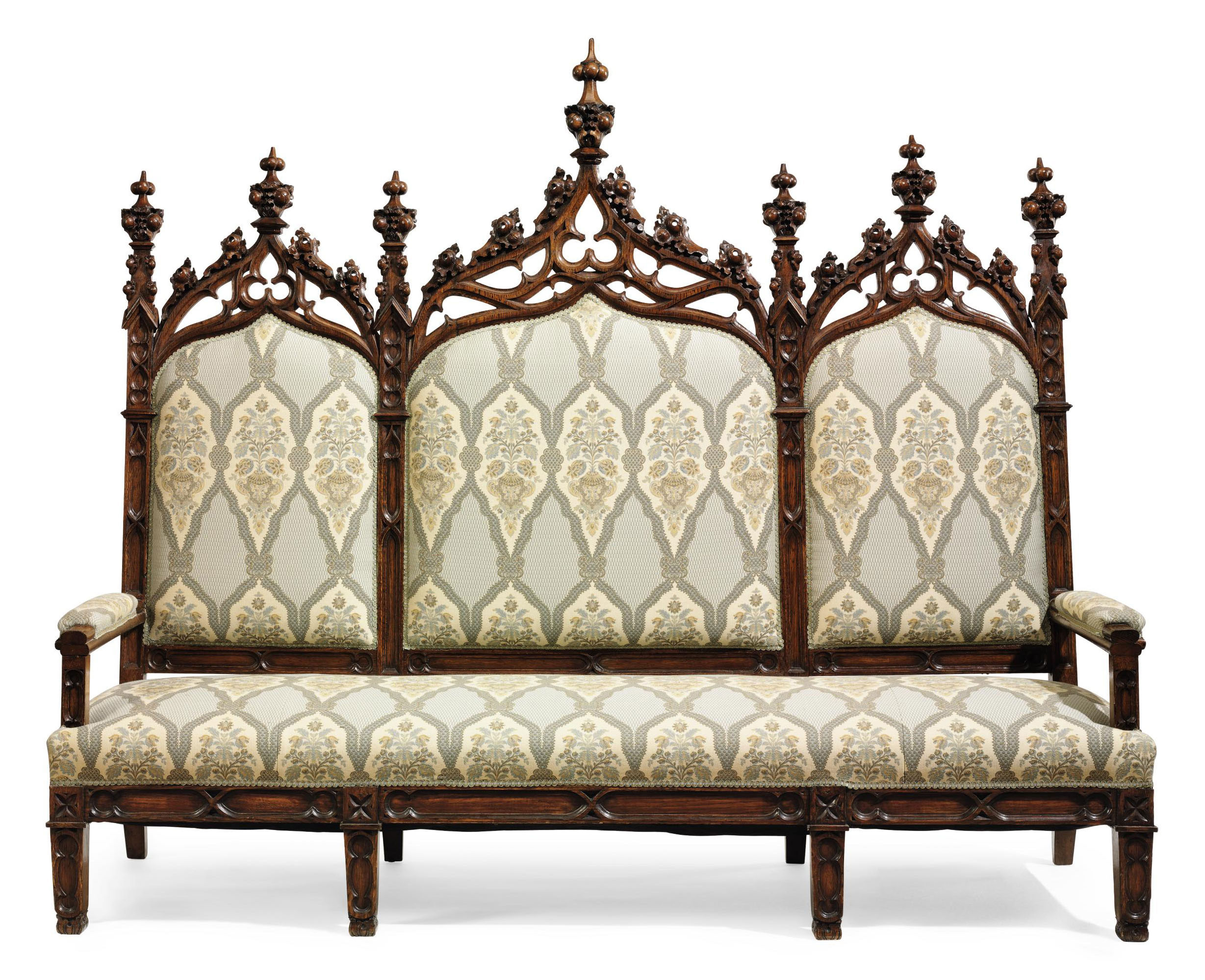 A GOTHIC REVIVAL CARVED OAK TRIPLE-BACK HALL SETTEE , ENGLISH OR AMERICAN, LATE 19TH CENTURY ...