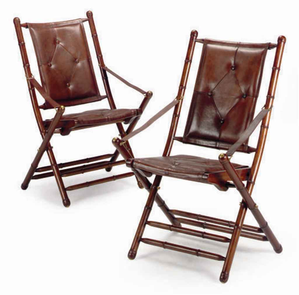 A PAIR OF SIMULATED BAMBOO AND LEATHER FOLDING CHAIRS ...