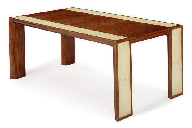 An American Oak And Parchment Covered Extending Dining Table
