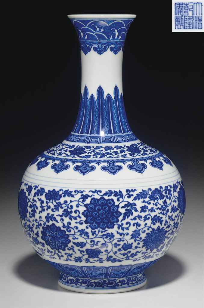 A BLUE AND WHITE BOTTLE VASE , QIANLONG SEAL MARK IN UNDERGLAZE BLUE