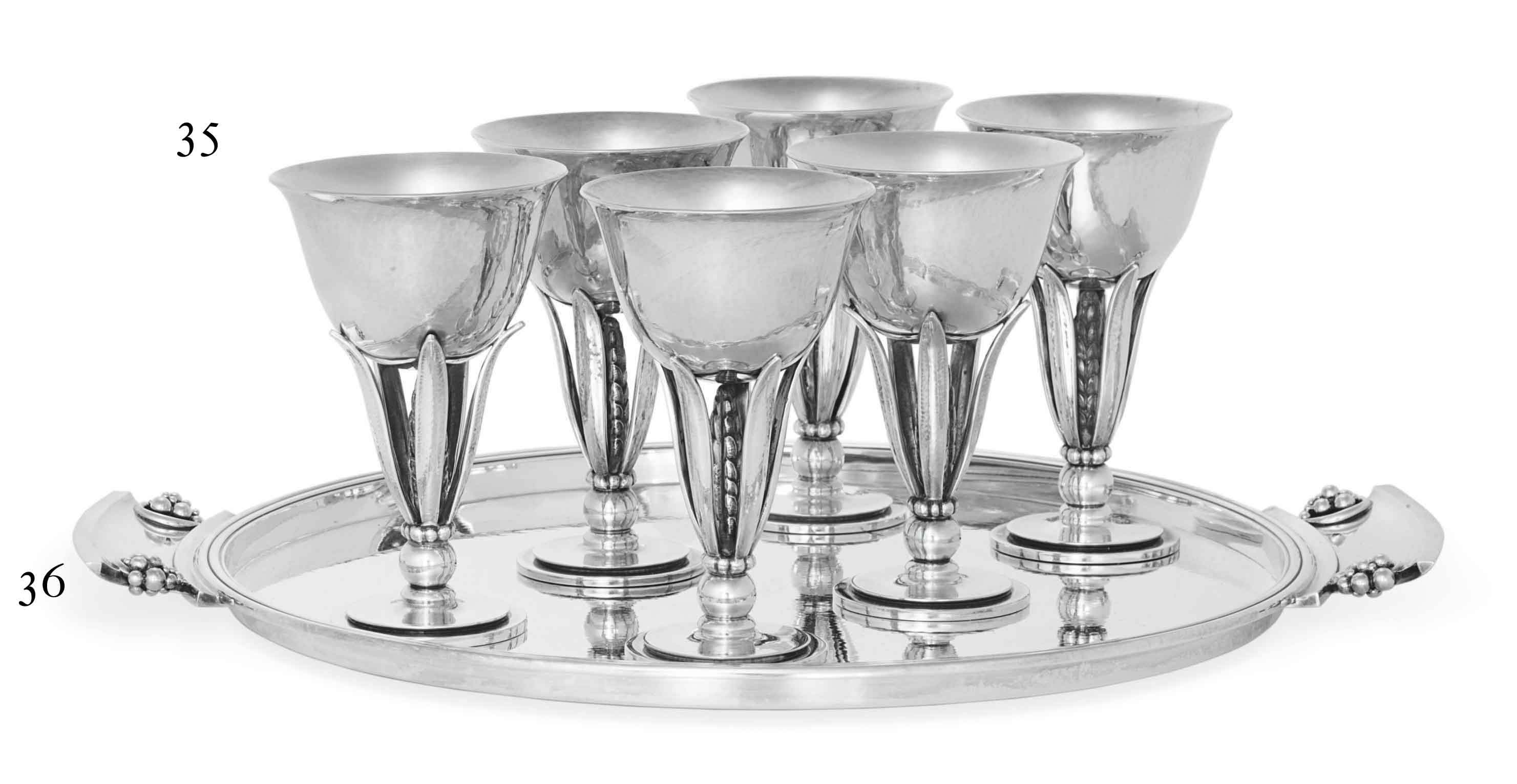 A SET OF SIX DANISH SILVER COCKTAIL CUPS, DESIGNED BY HARALD NIELSEN