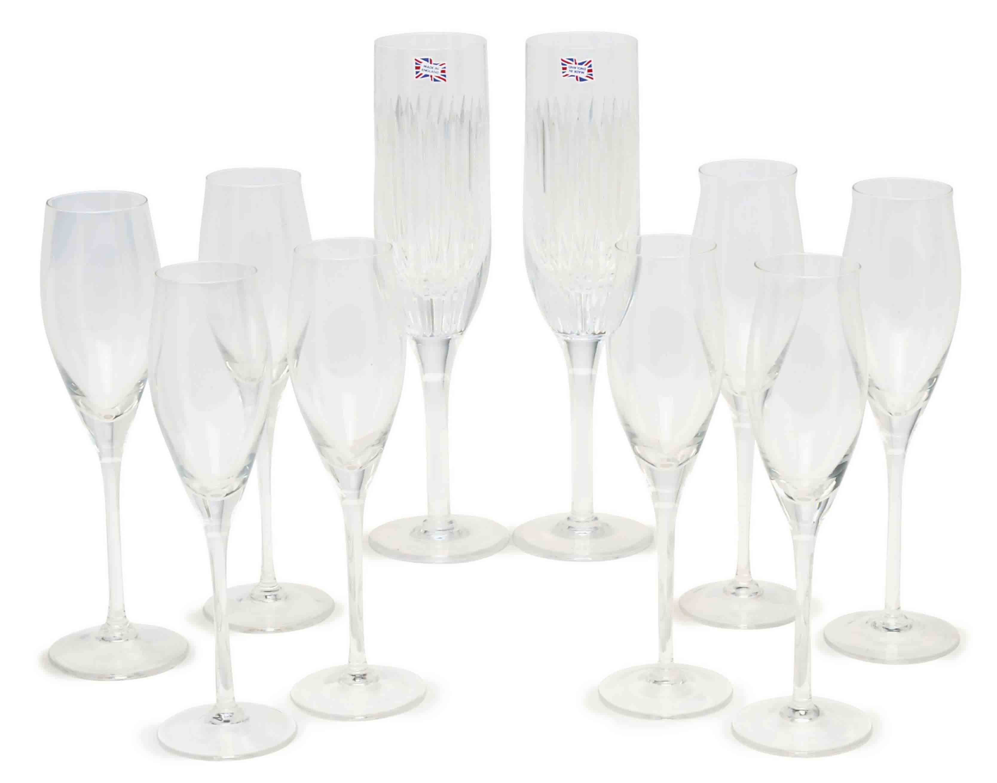 A SET OF EIGHT COLORLESS GLASS CHAMPAGNE FLUTES, , MODERN, RETAILED BY CARTIER, Christie's