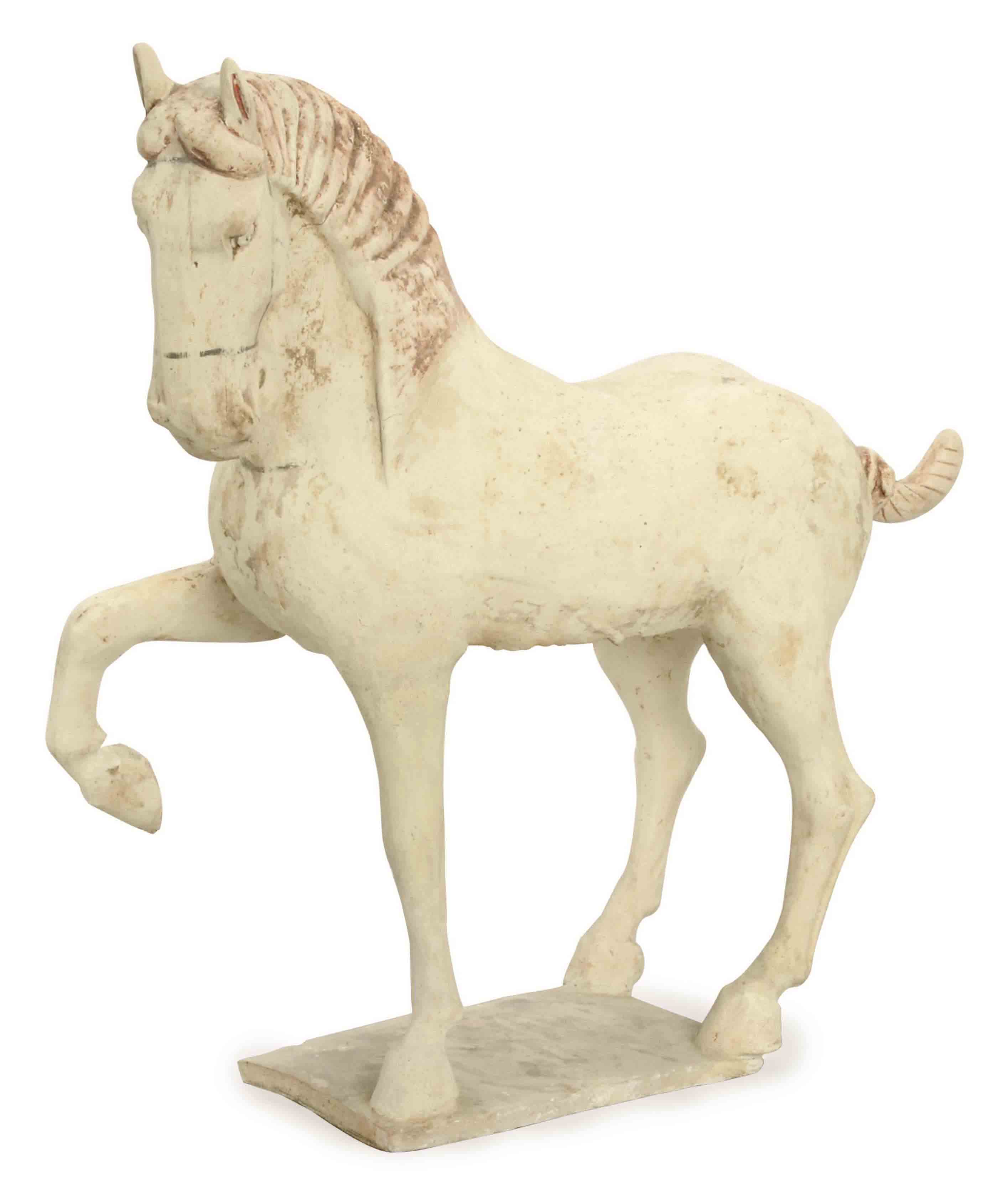 A CHINESE PAINTED POTTERY FIGURE OF A PRANCING HORSE, , TANG DYNASTY
