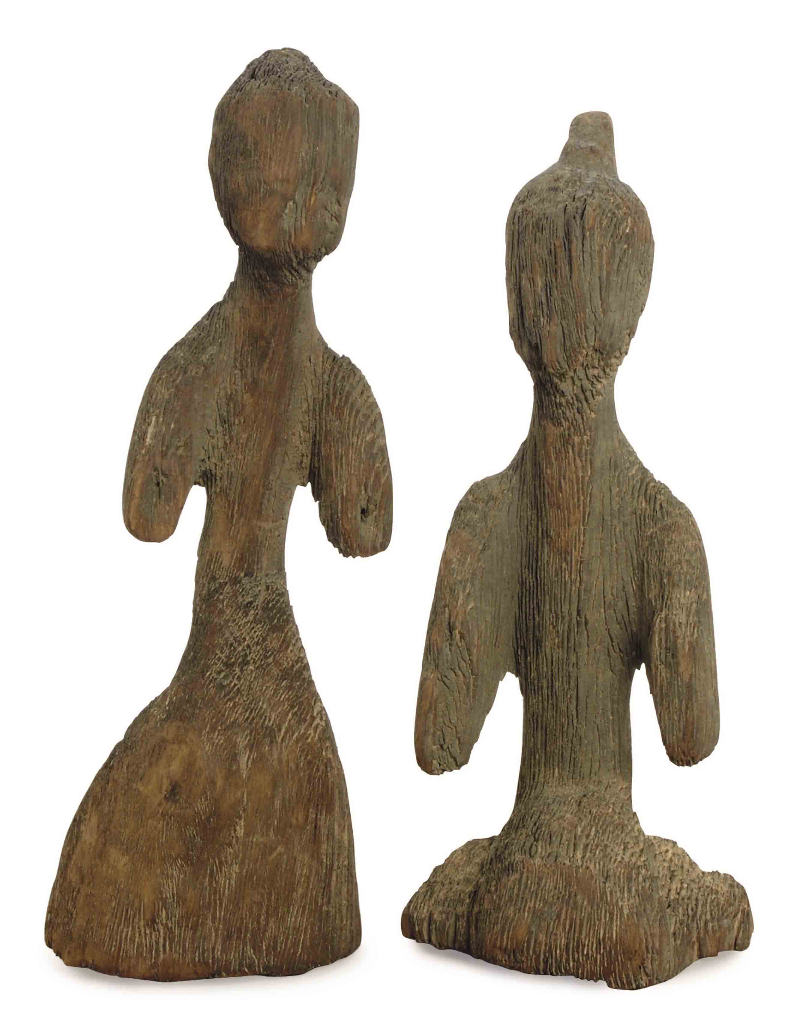 A PAIR OF CHINESE WOOD FIGURES, , HAN DYNASTY (206 BCAD 220) Christie's