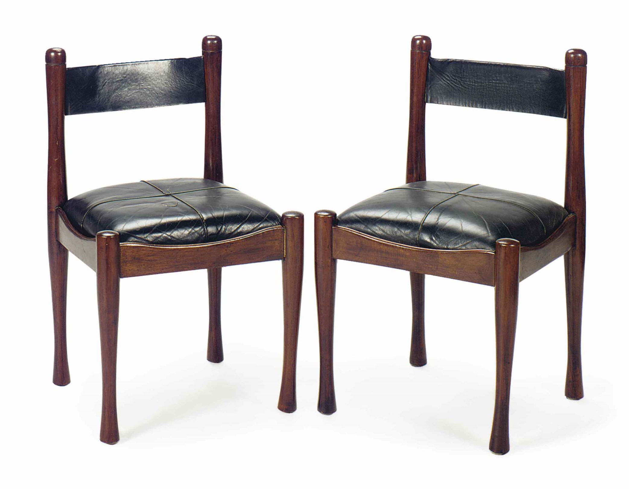 A SET OF SEVEN BLACK LEATHER AND TURNED MAHOGANY SIDE CHAIRS,
