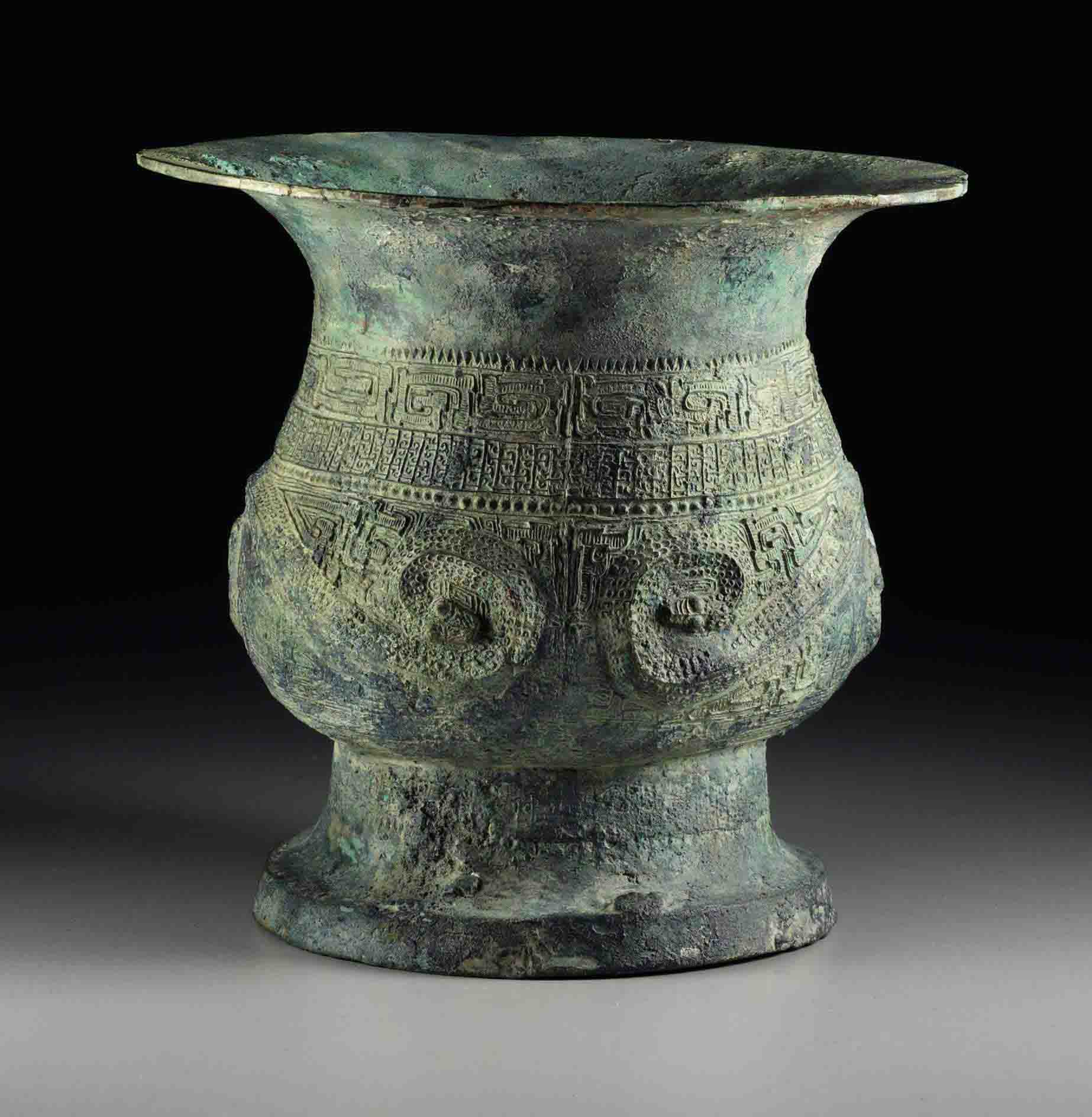 AN UNUSUAL BRONZE RITUAL WINE VESSEL, ZUN , SOUTHEAST CHINA, SPRING AND AUTUMN PERIOD (770476