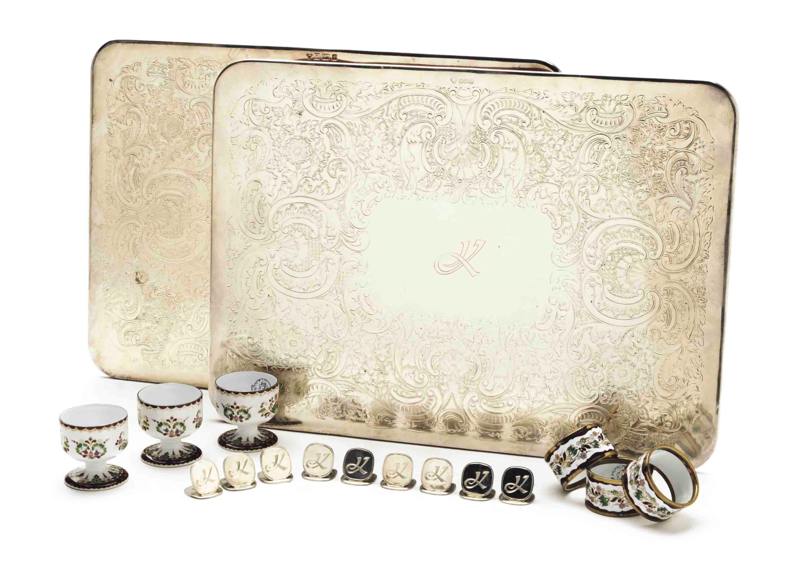 A SET OF EIGHT ENGLISH SILVERMOUNTED PLACEMATS AND TWENTYFOUR SILVER