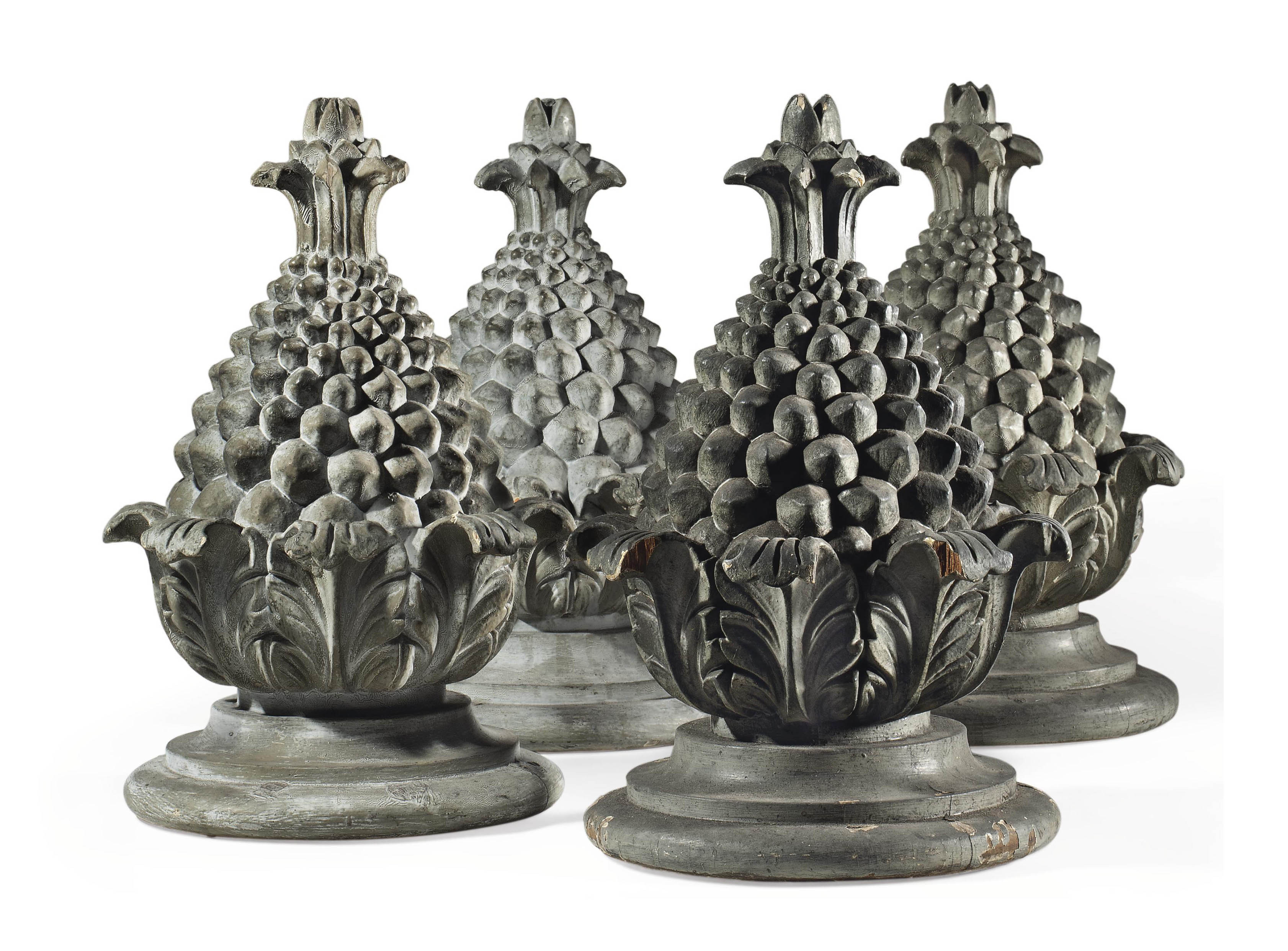A SET OF FOUR GREY-PAINTED FINIALS A SET OF FOUR GREY-PAINTED FINIALS 