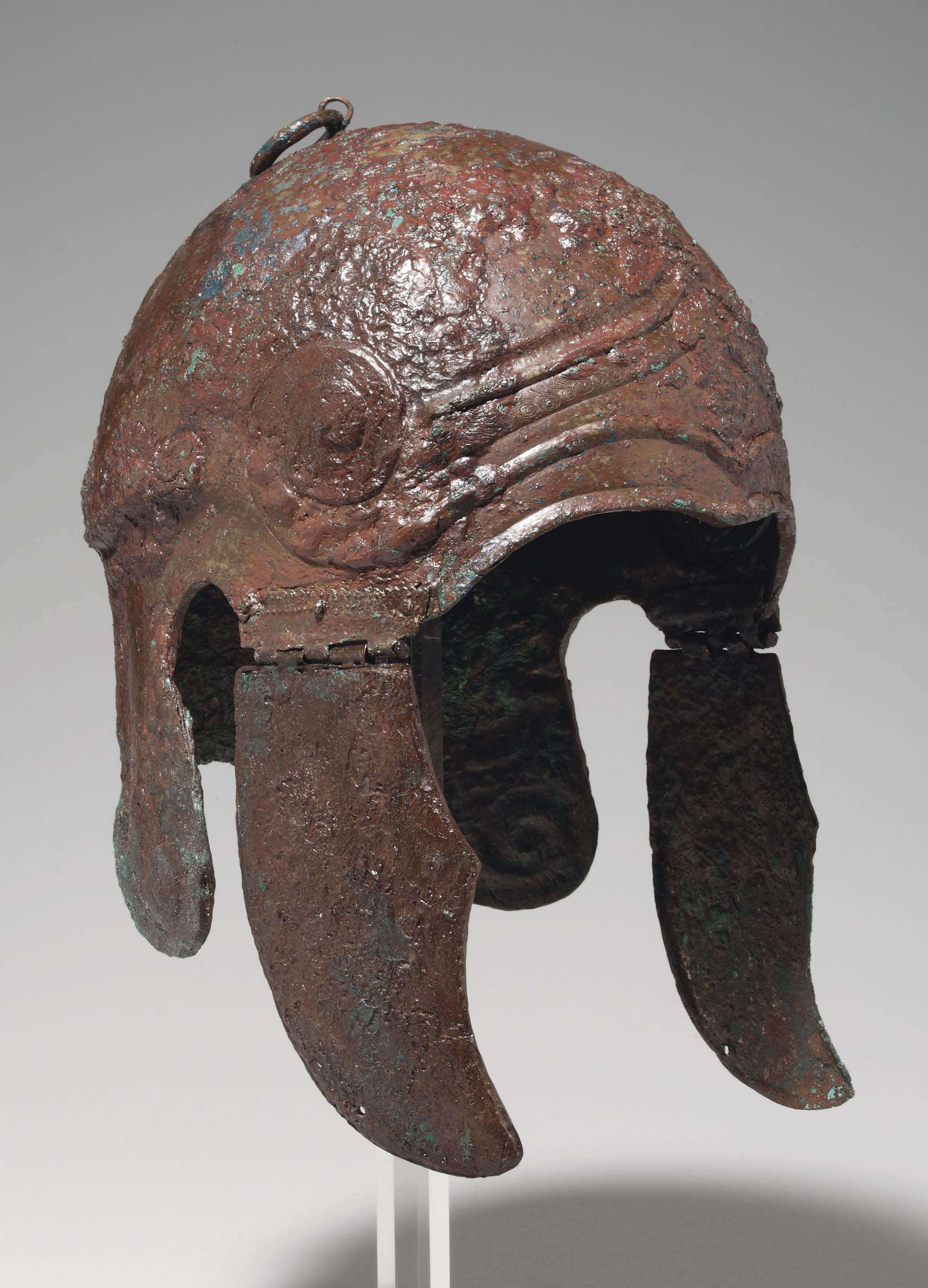 A GREEK BRONZE HELMET OF CHALCIDIAN TYPE , LATE CLASSICAL PERIOD, CIRCA