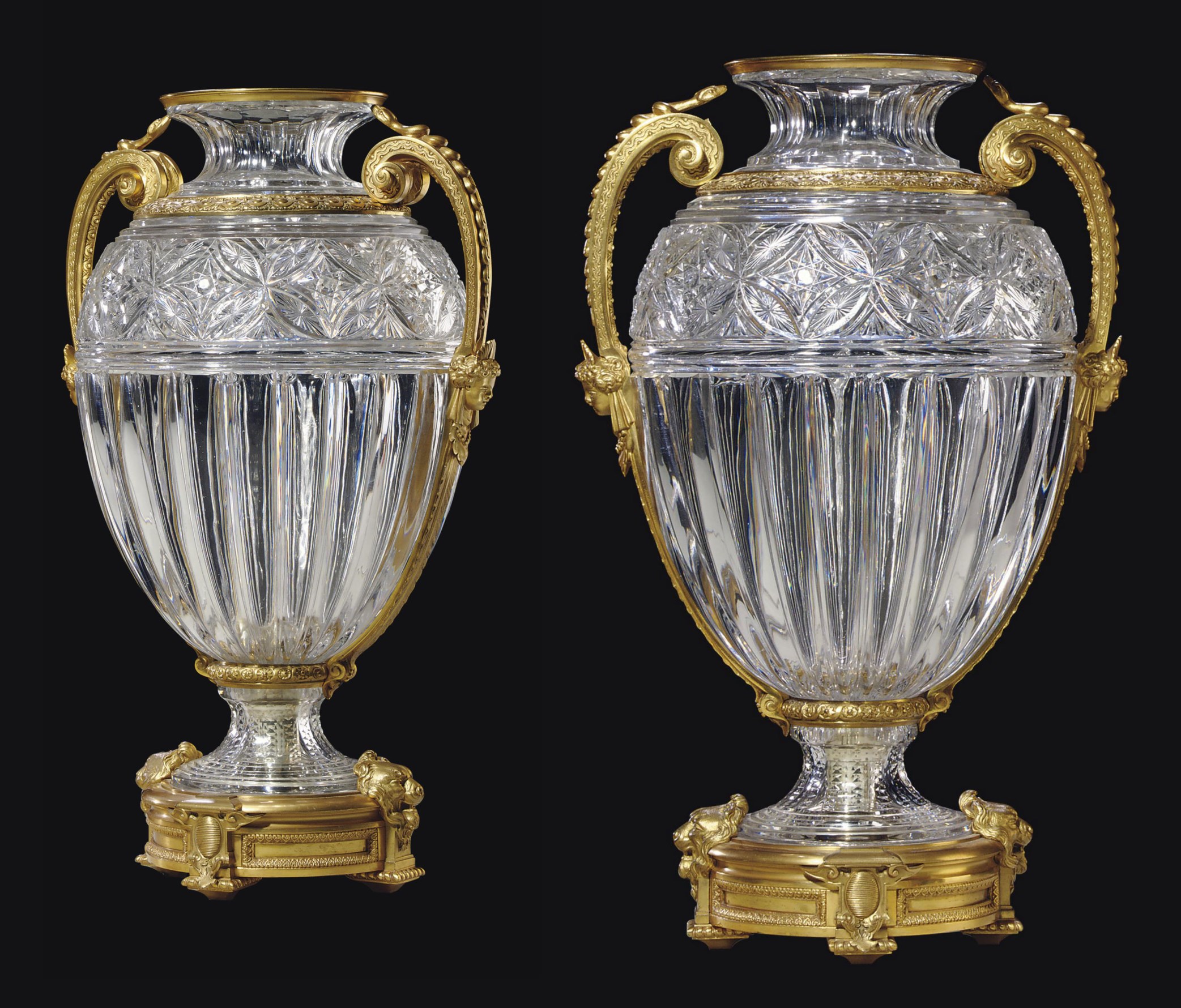 A LARGE PAIR OF FRENCH ORMOLUMOUNTED DEEPCUT CRYSTAL VASES , BY BACCARAT, PARIS, CIRCA 1890