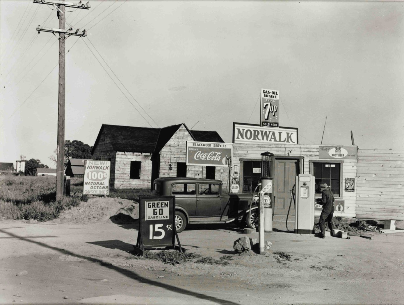 DOROTHEA LANGE (18951965) , Riverbank Gas Station, 1940 Christie's